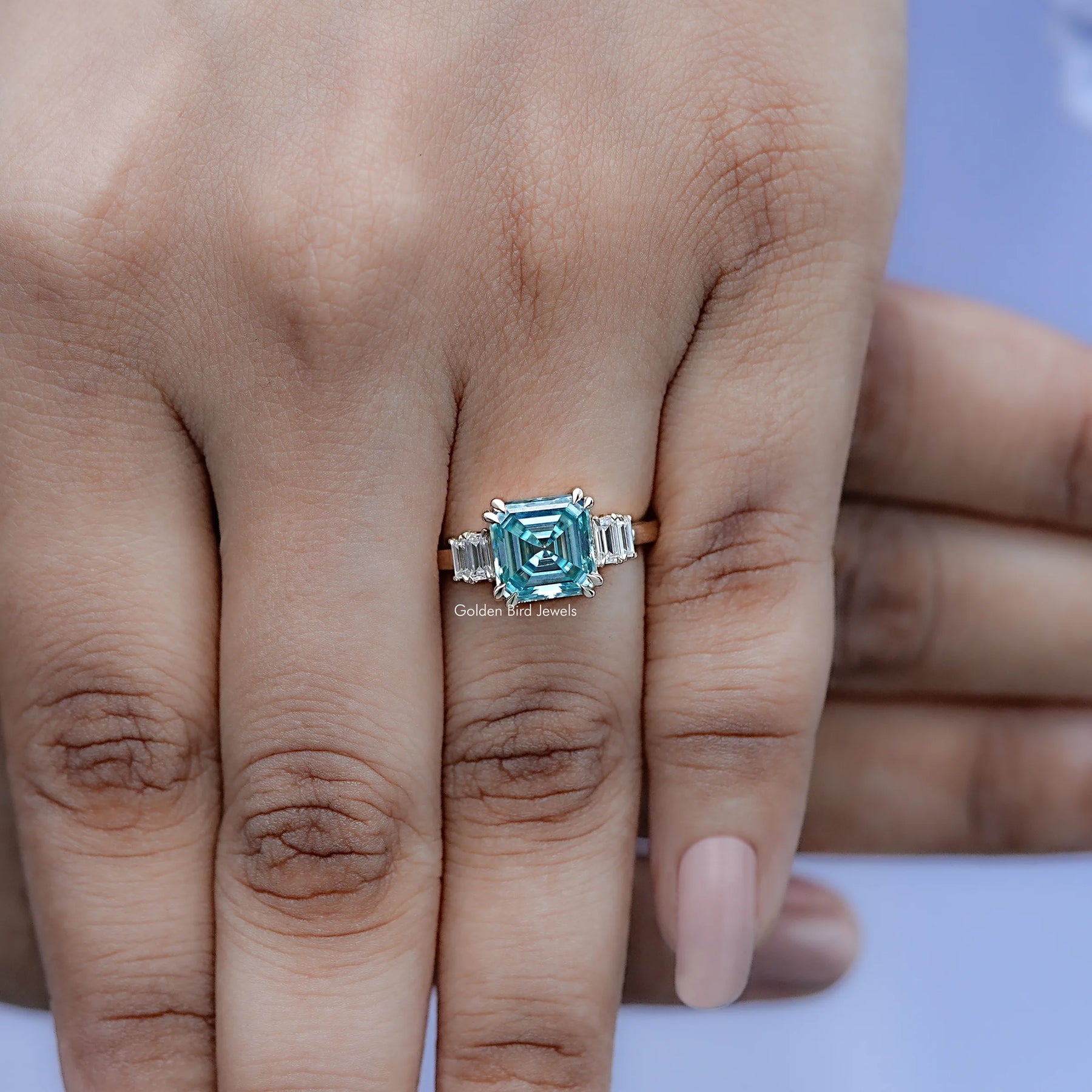 View of Asscher Five Stone Engagement Ring in prongs setting