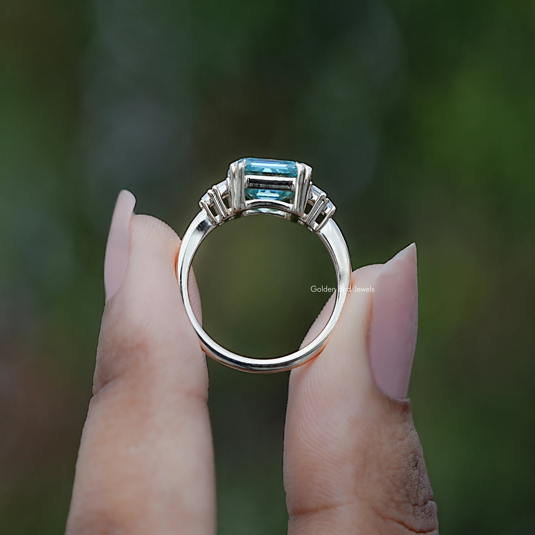 Back view of Asscher Five Stone Engagement Ring in secure setting