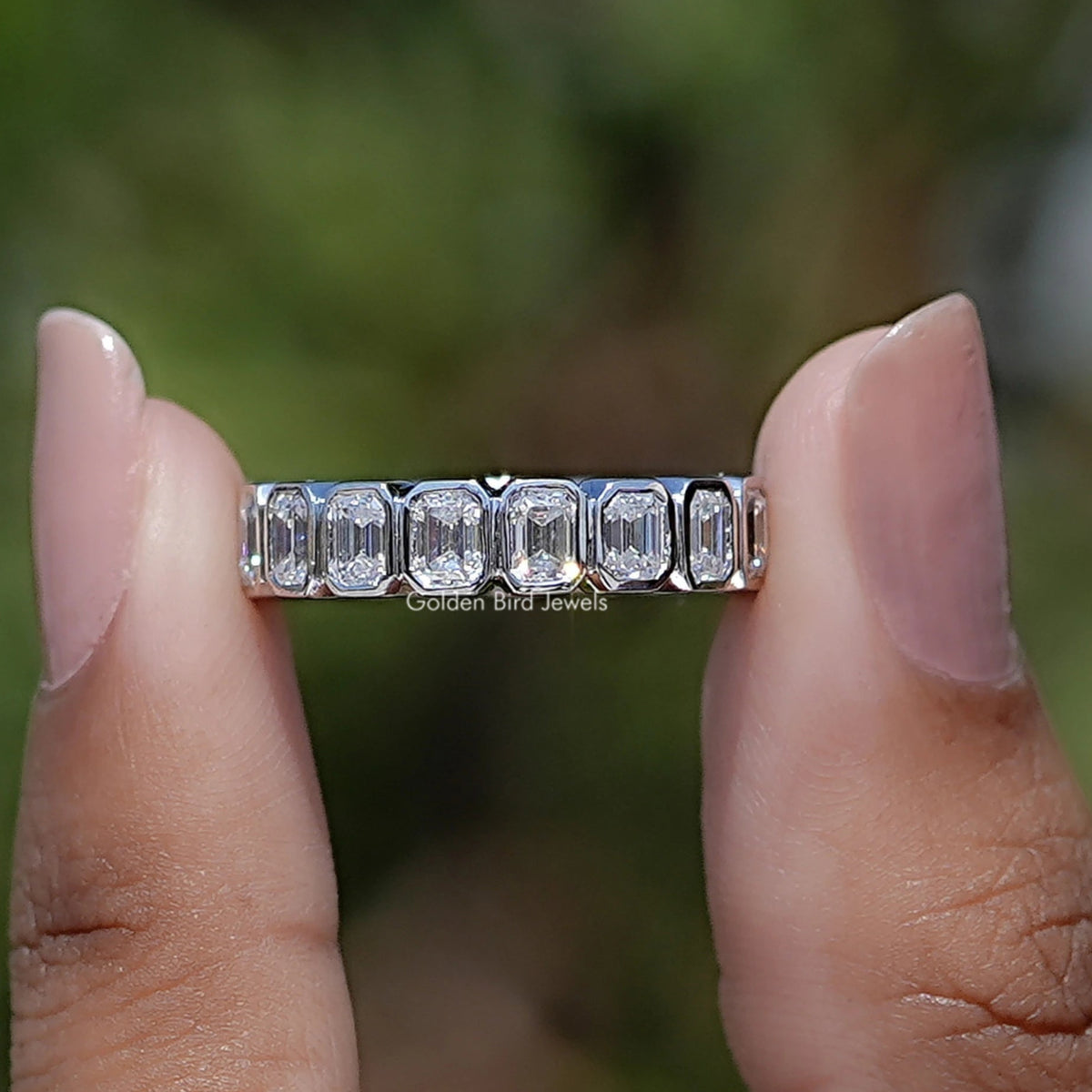 Front view of Bezel Set Emerald Cut Full Eternity Band