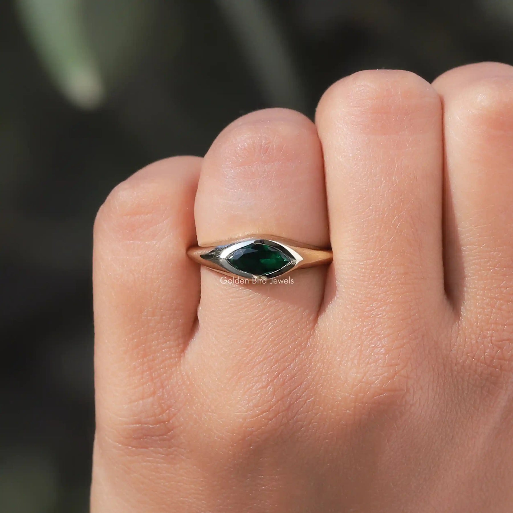 Close-Up View of Green Marquise Cut Moissanite Ring In White Gold