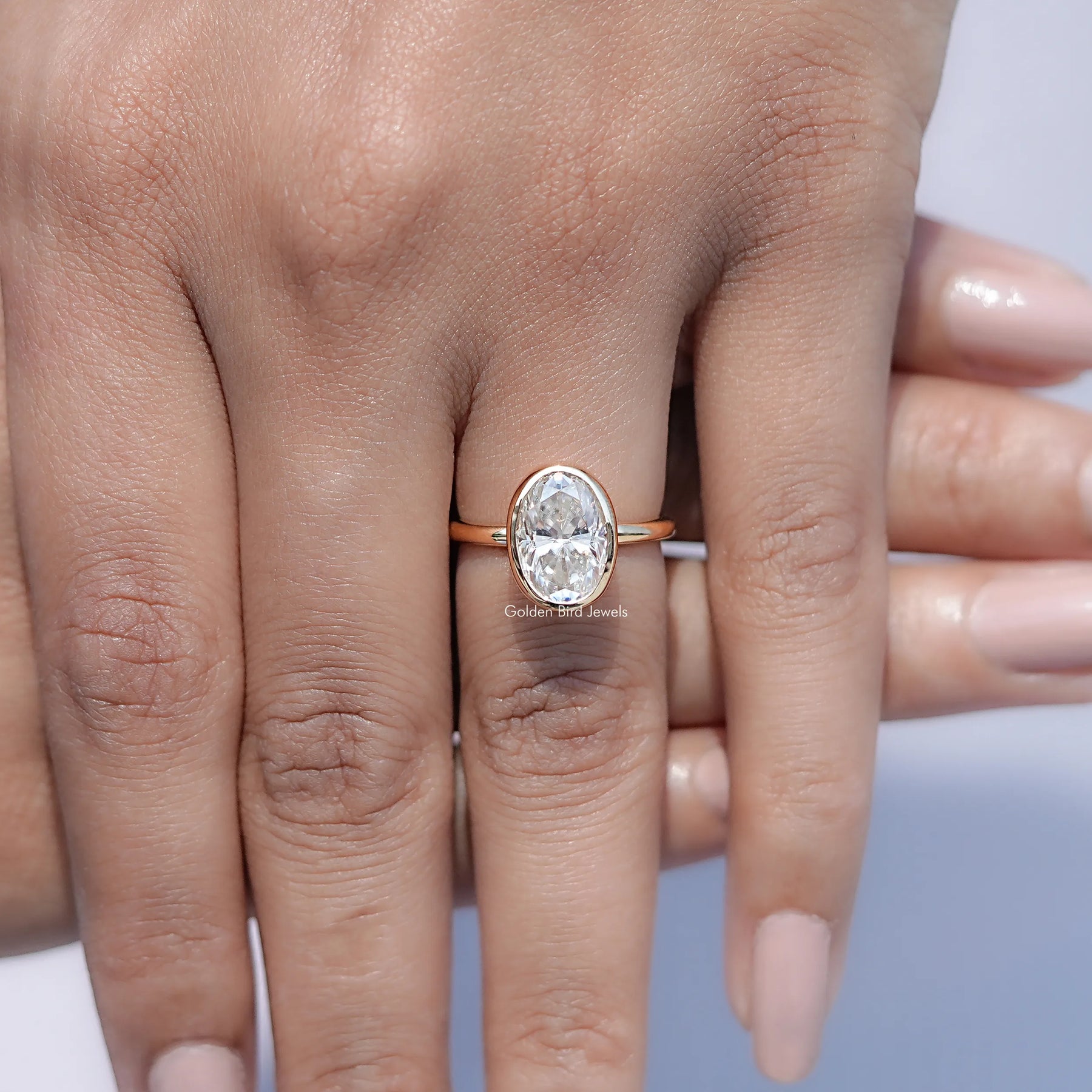 Close view of Oval Moissanite Halo Engagement Ring