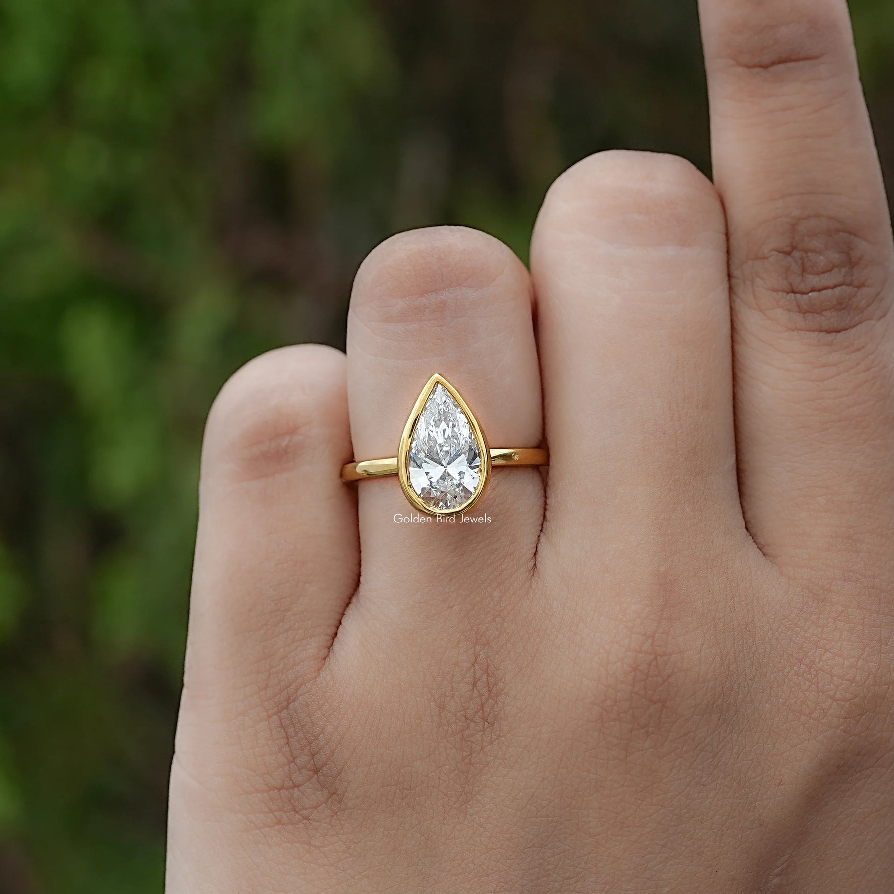 Front view of Bezel Set Pear Cut Lab Diamond Solitaire Ring