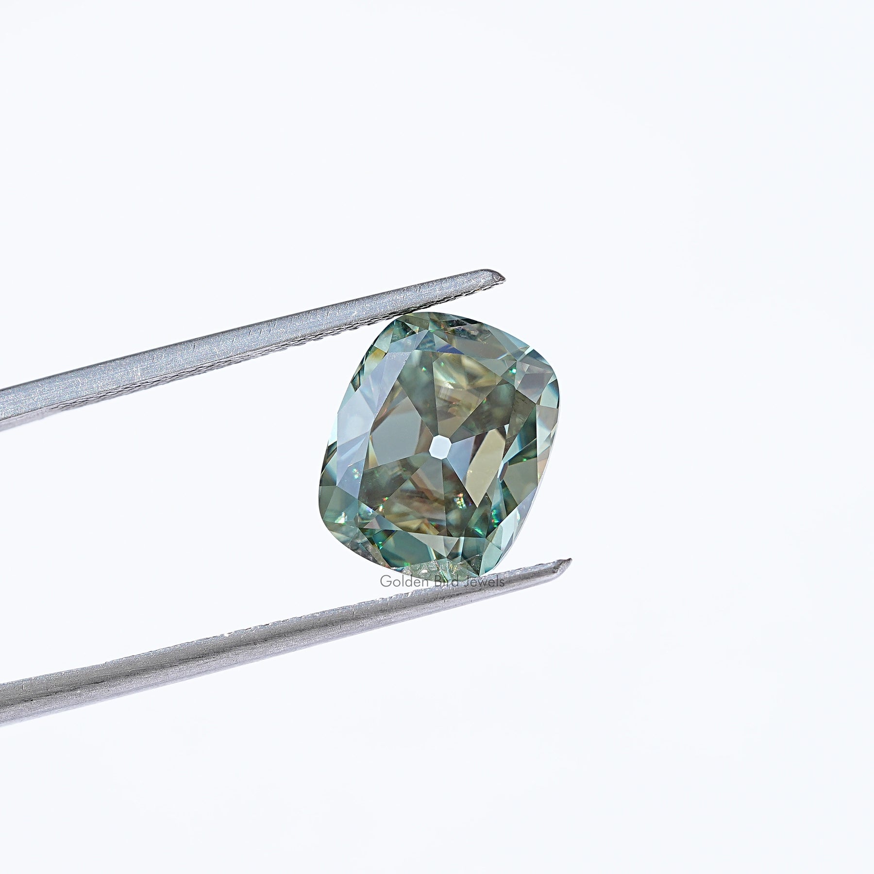 View Of Blue Green Cushion Cut Loose Moissanite