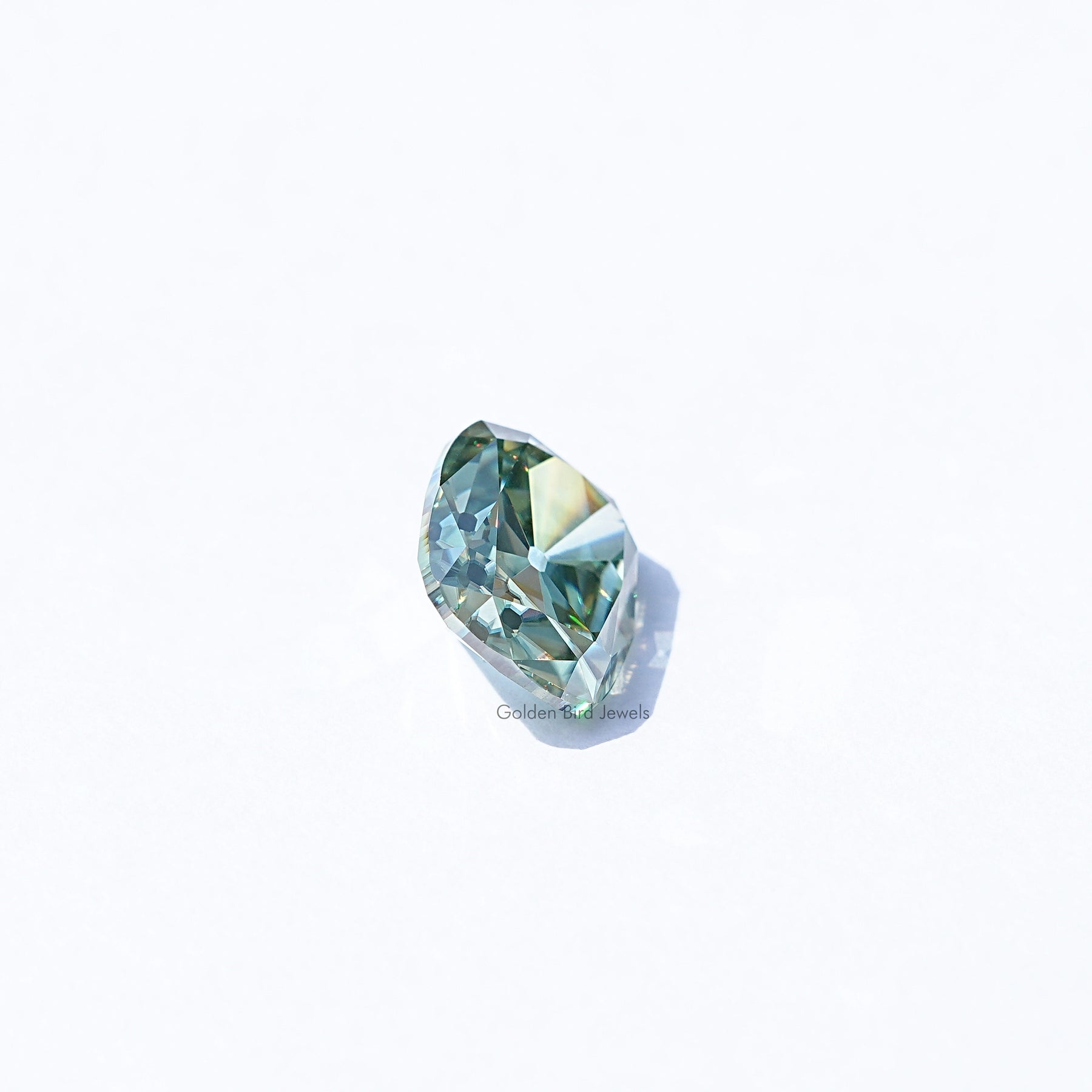 Side View Of Blue Green Cushion Cut Loose Stone