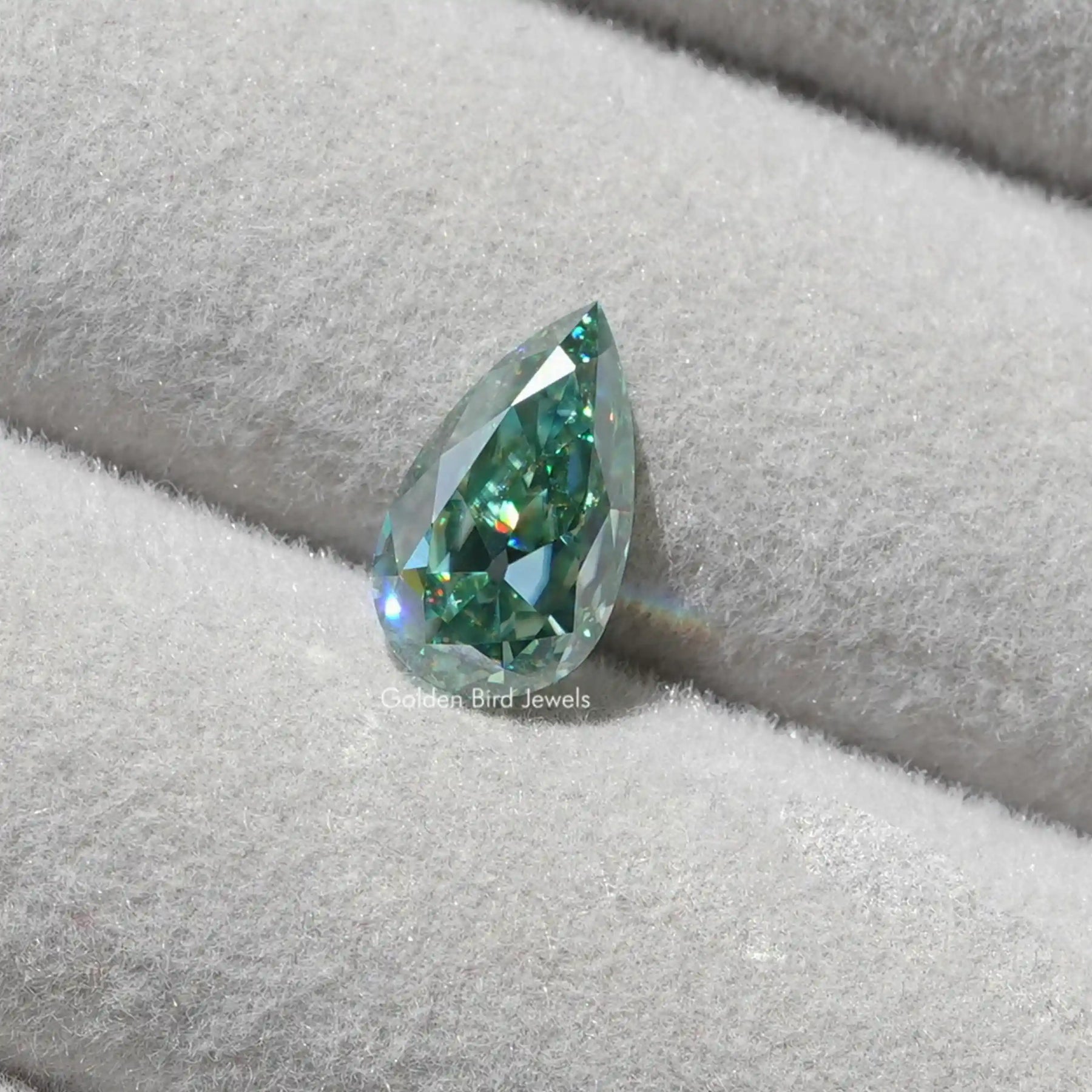 Detailed view of Blue Green Pear Cut Loose Stone