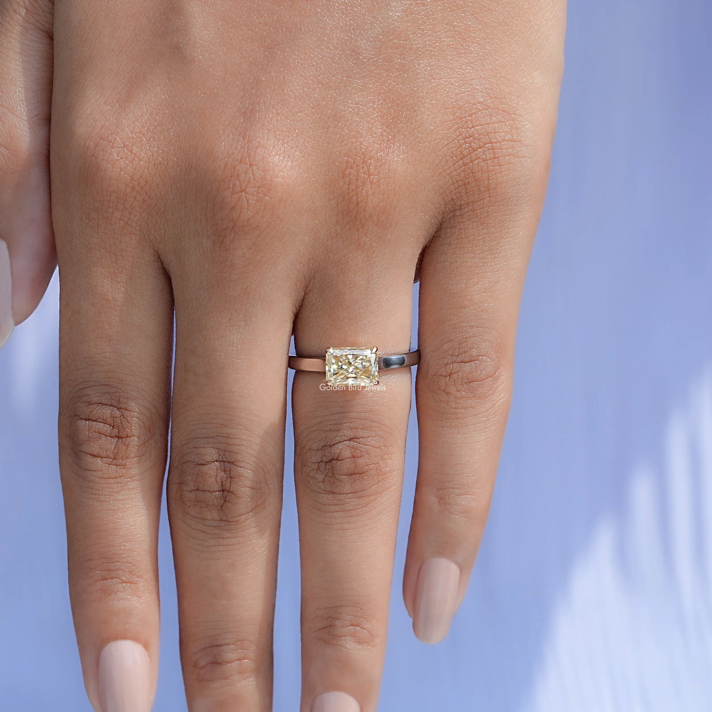 Top view of East West Yellow Radiant moissanite Solitaire Ring for women 's wear