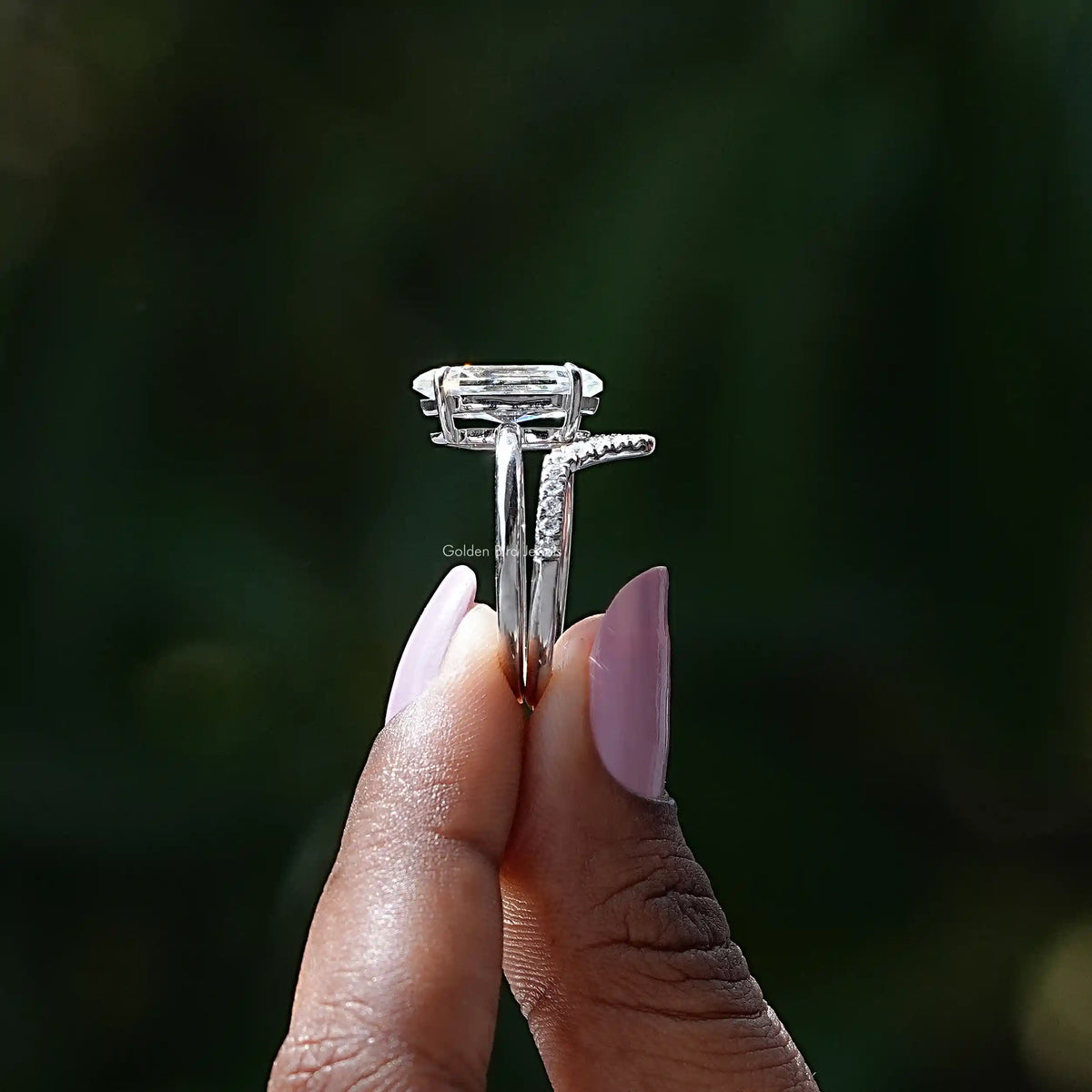 Side View of Hexagon Cut Moissanite Ring In two fingers