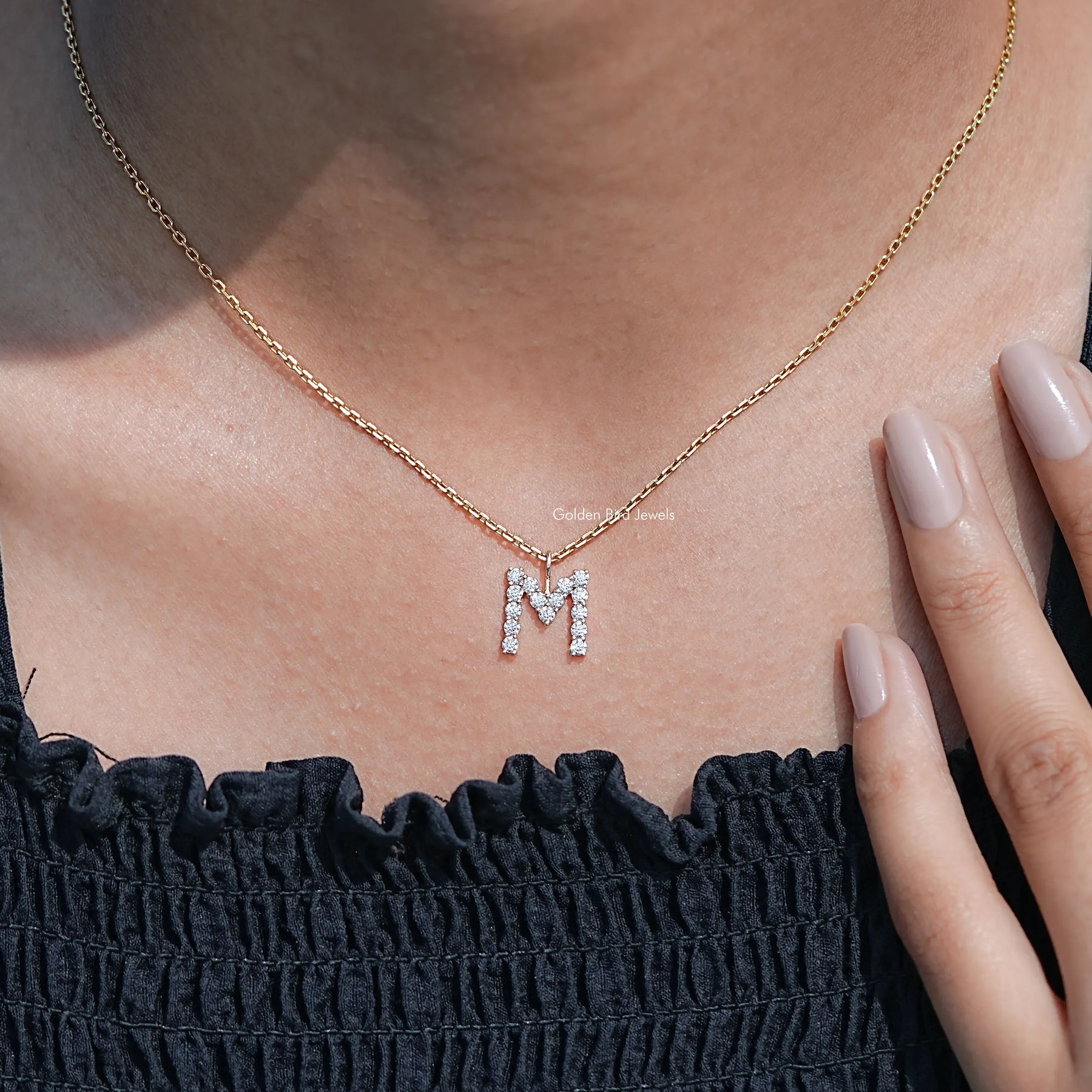 Side View Of M Letter Pendant in unique pattern