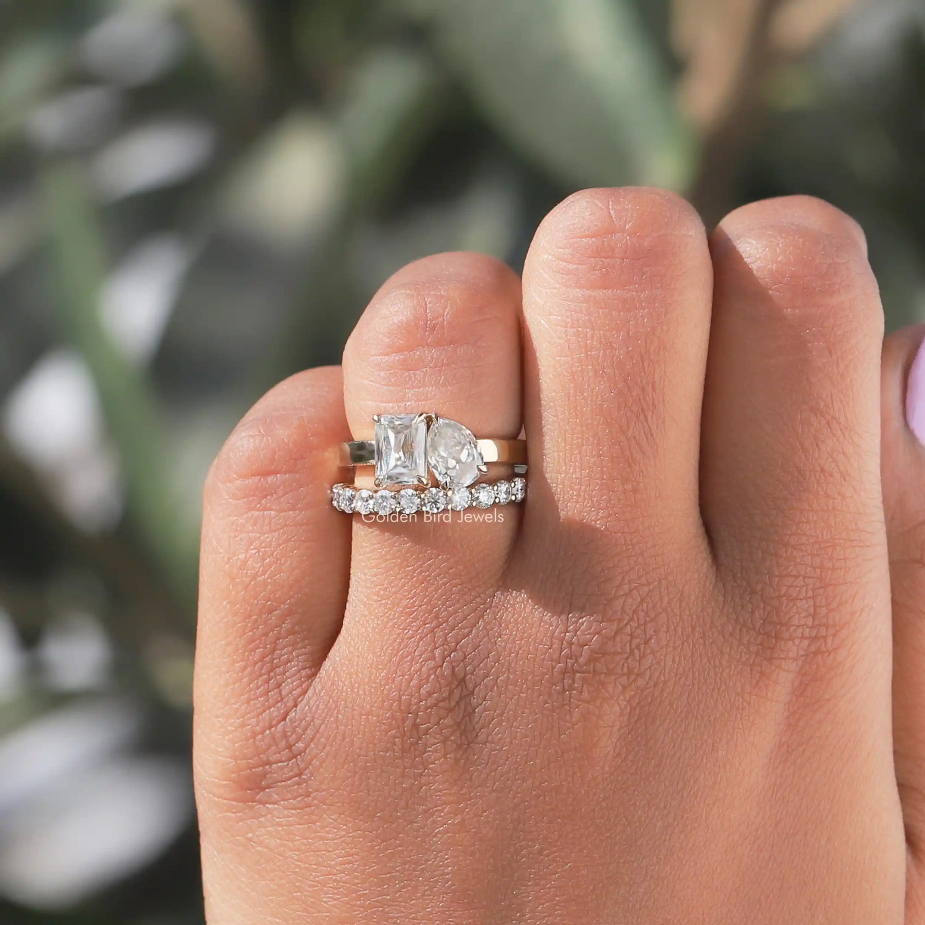 View of Old Mne Pear and Criss Cut Moissanite Ring In Finger