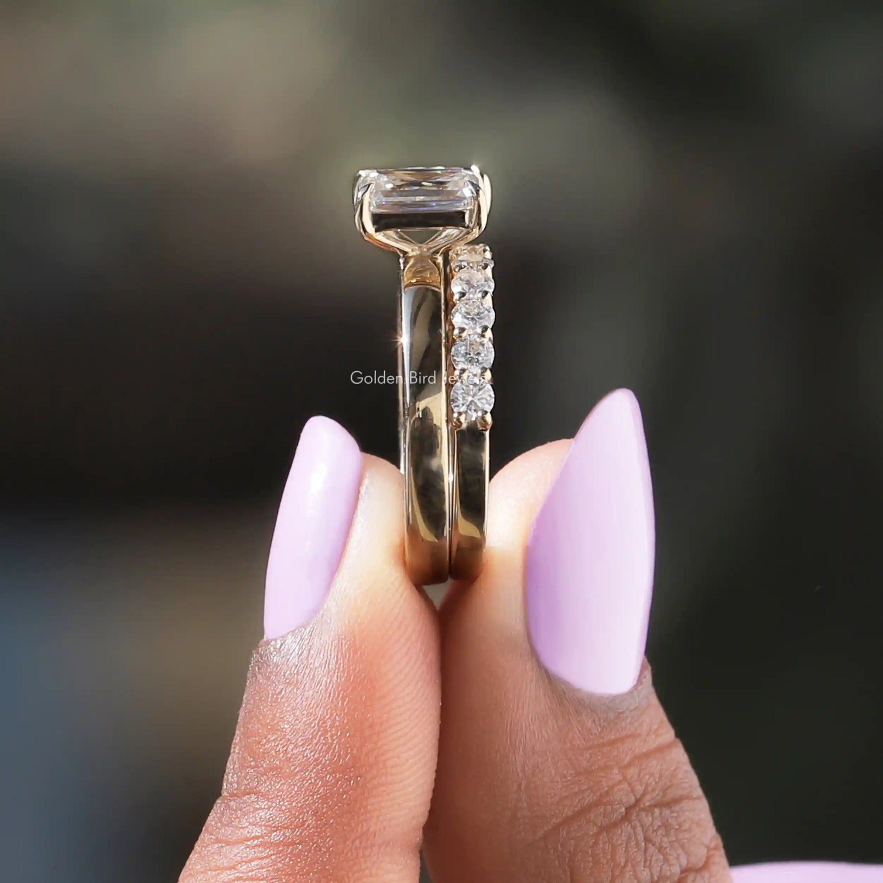 Side View Of toi et Moi Ring With Matching Round Cut Wedding Band In finger