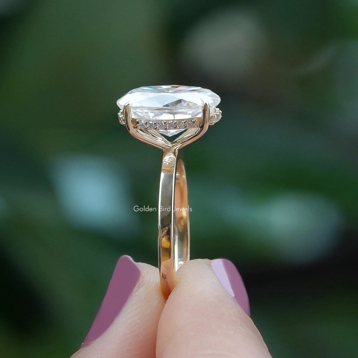 Side View of Oval Cut Solitaire Moissanite Hidden Halo Ring In finger