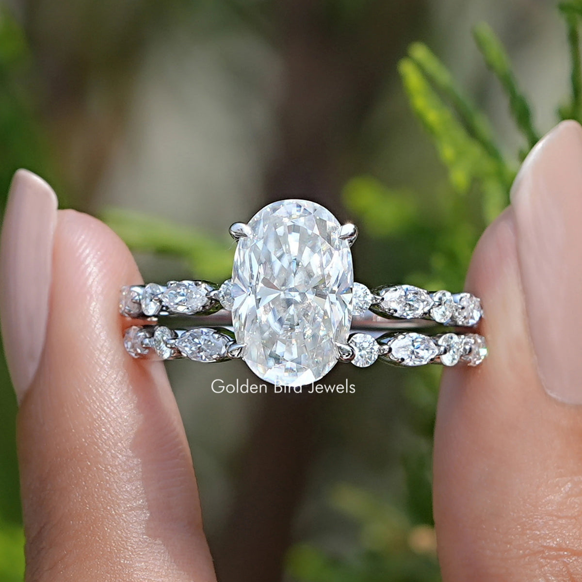 Front view of Crushed Ice Oval Cut Moissanite Bridal Ring Set