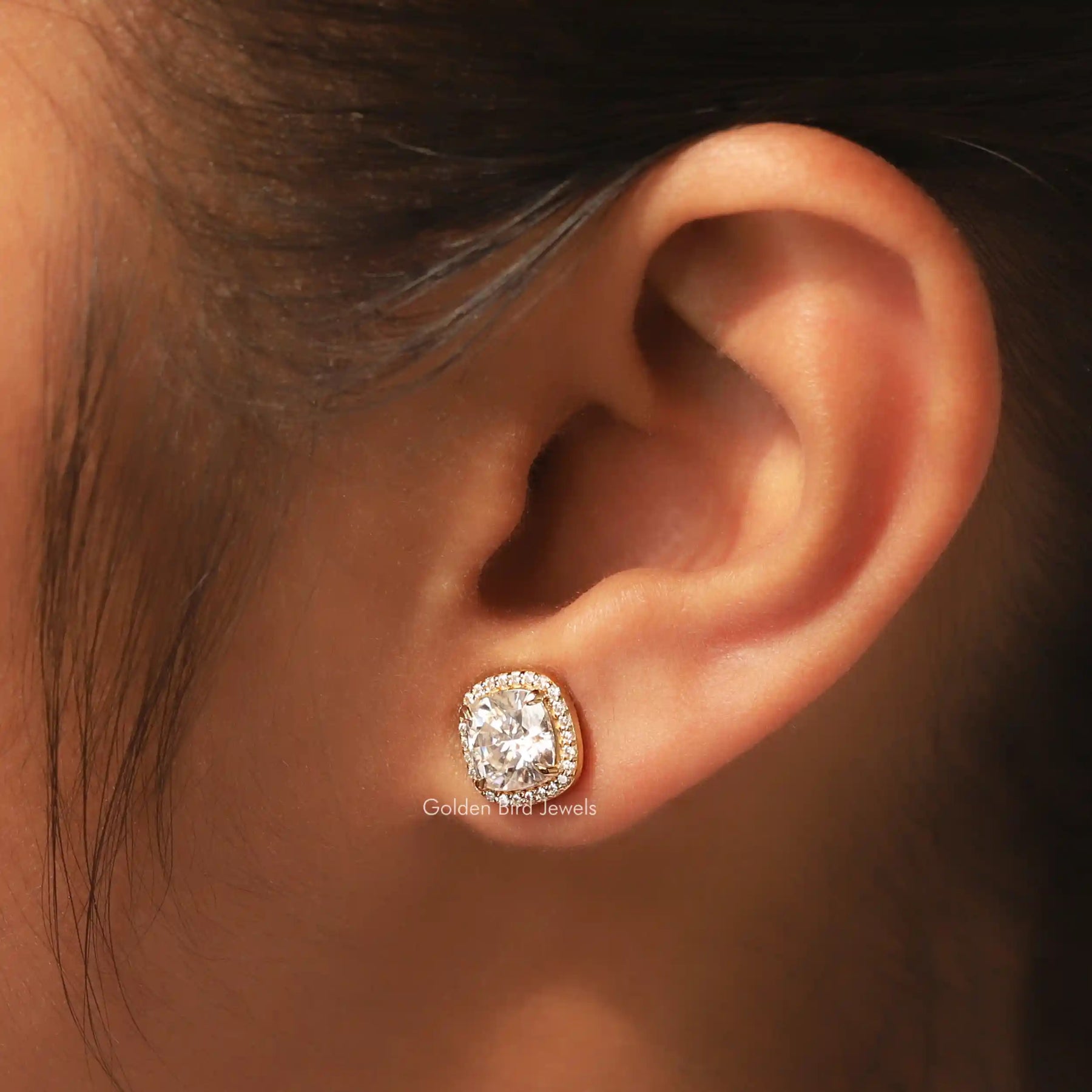 In ear view of round cut cluster moissanite earrings
