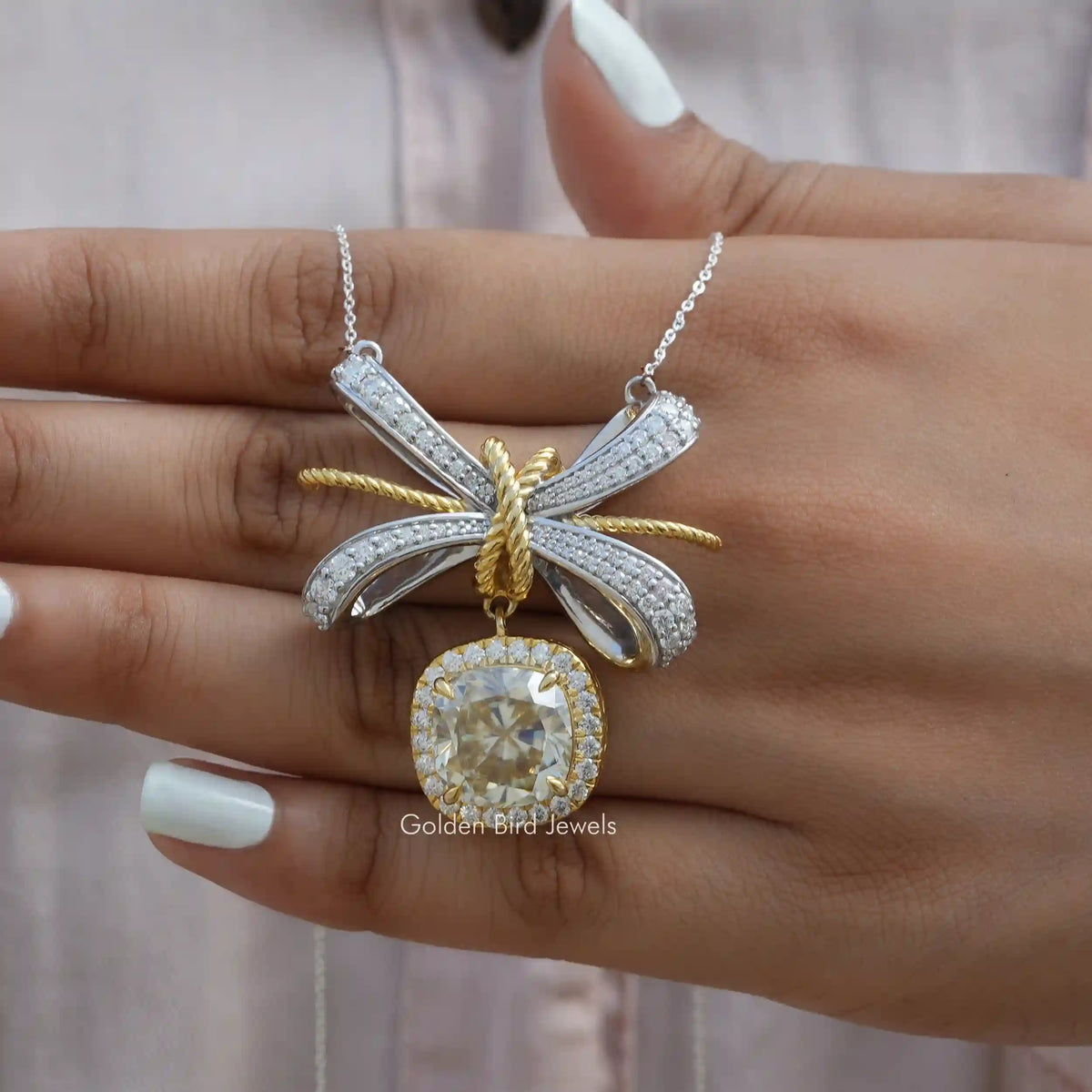 Front view of cushion cut moissanite halo pendant