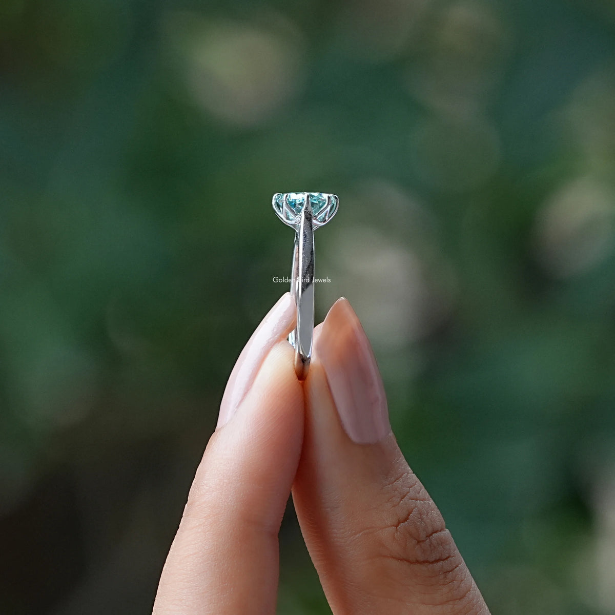 Side View of Round Cut Moissanite Prong Ring