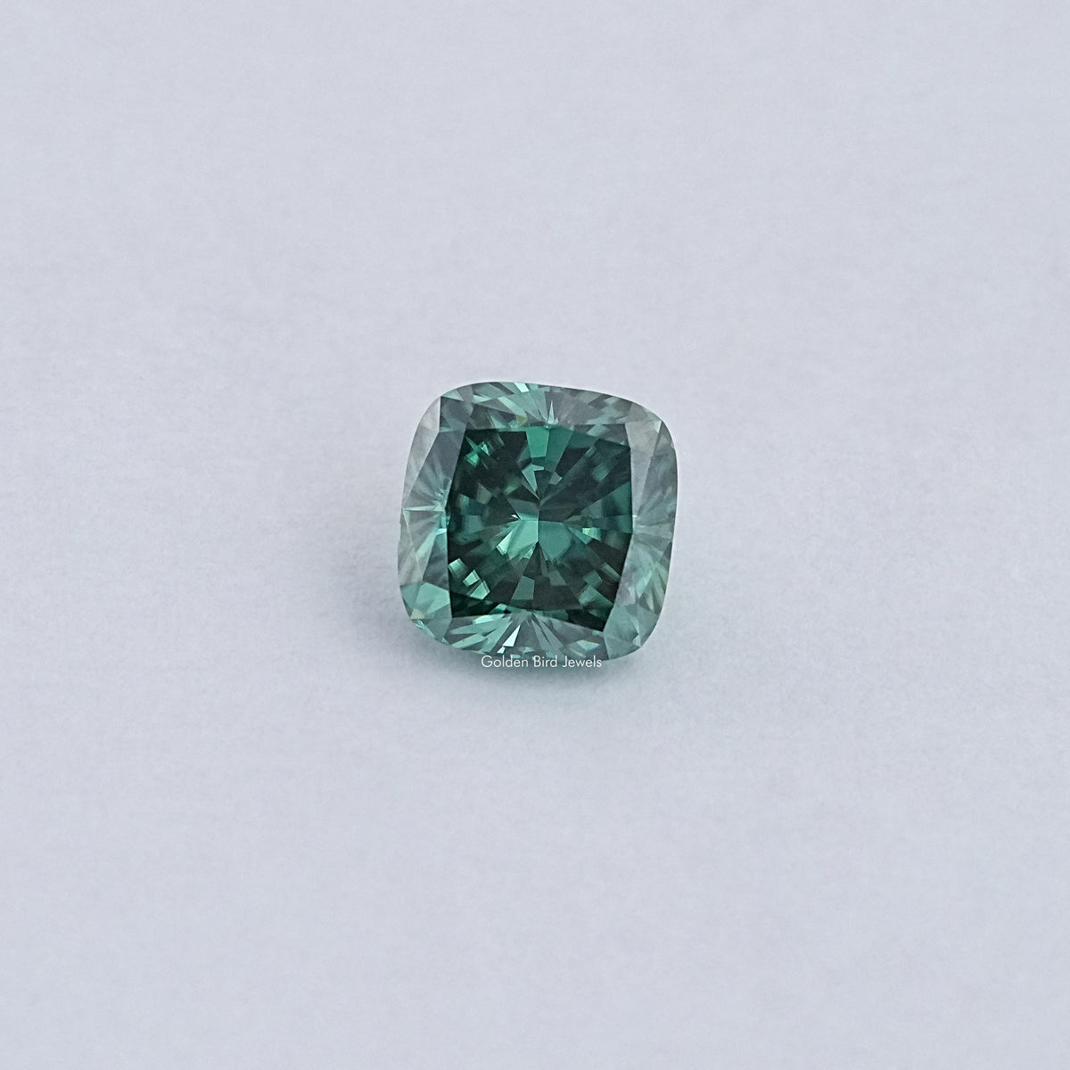 View Of Dark Green Cushion Cut Loose Moissanite