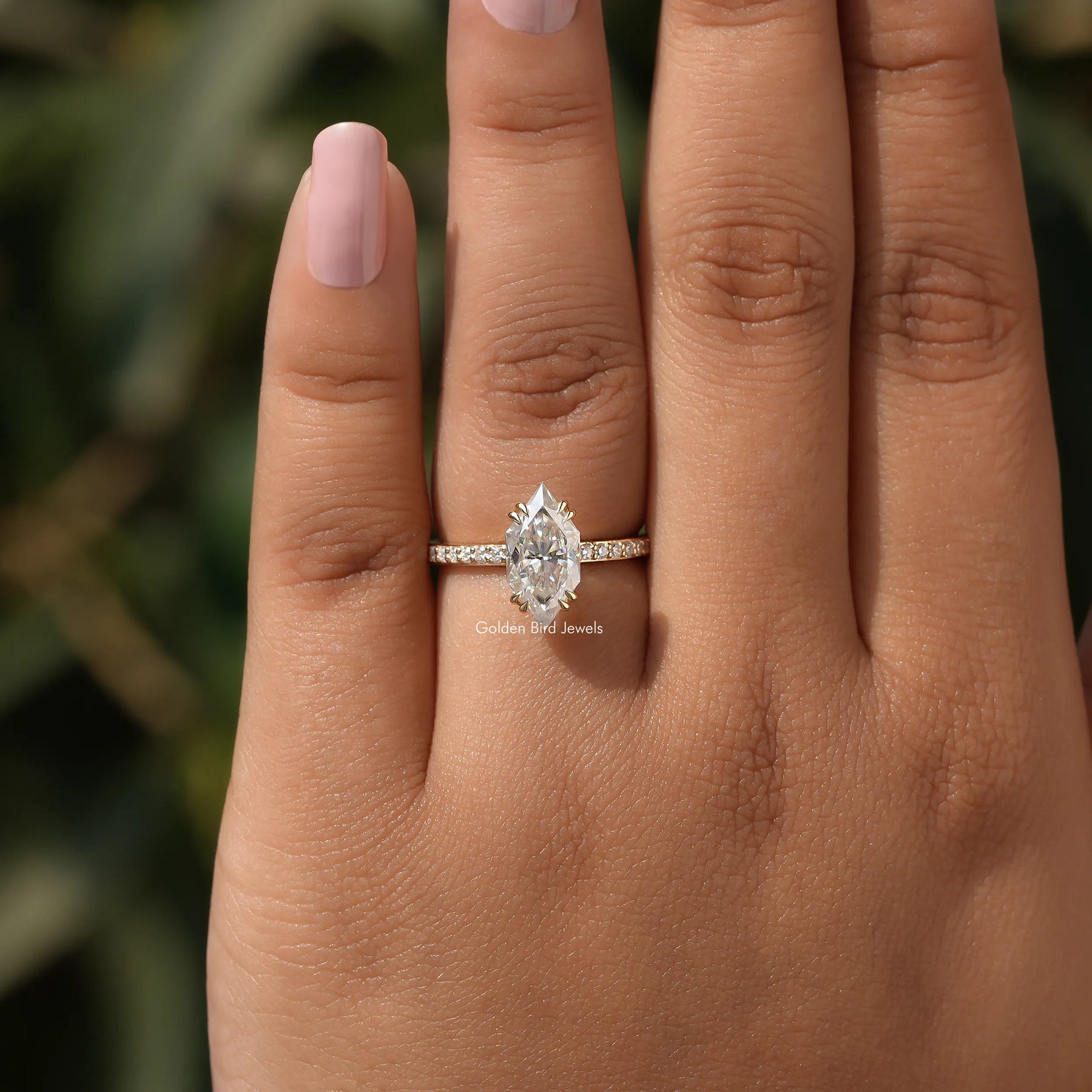In Finger view of moissanite  accent ring