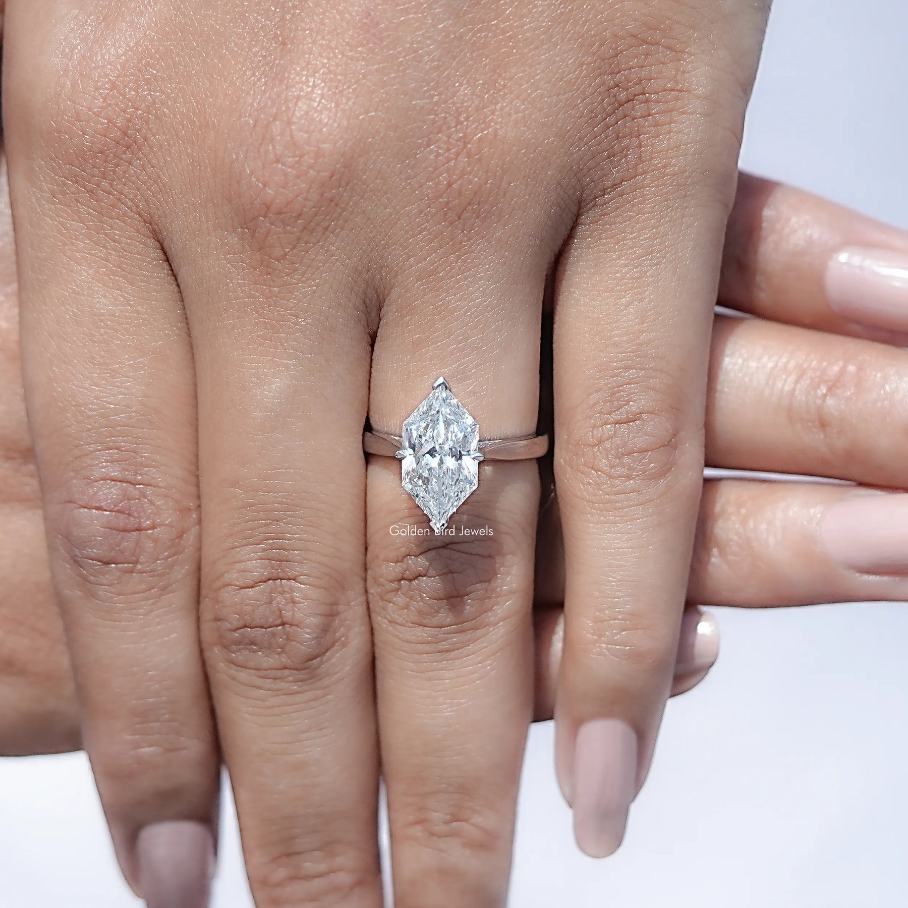 Detailed View of Marquise Cut Diamond Solitaire Ring in finger