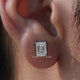 Close Up View Of Emerald Cut Diamond Solitaire Stud Earrings
