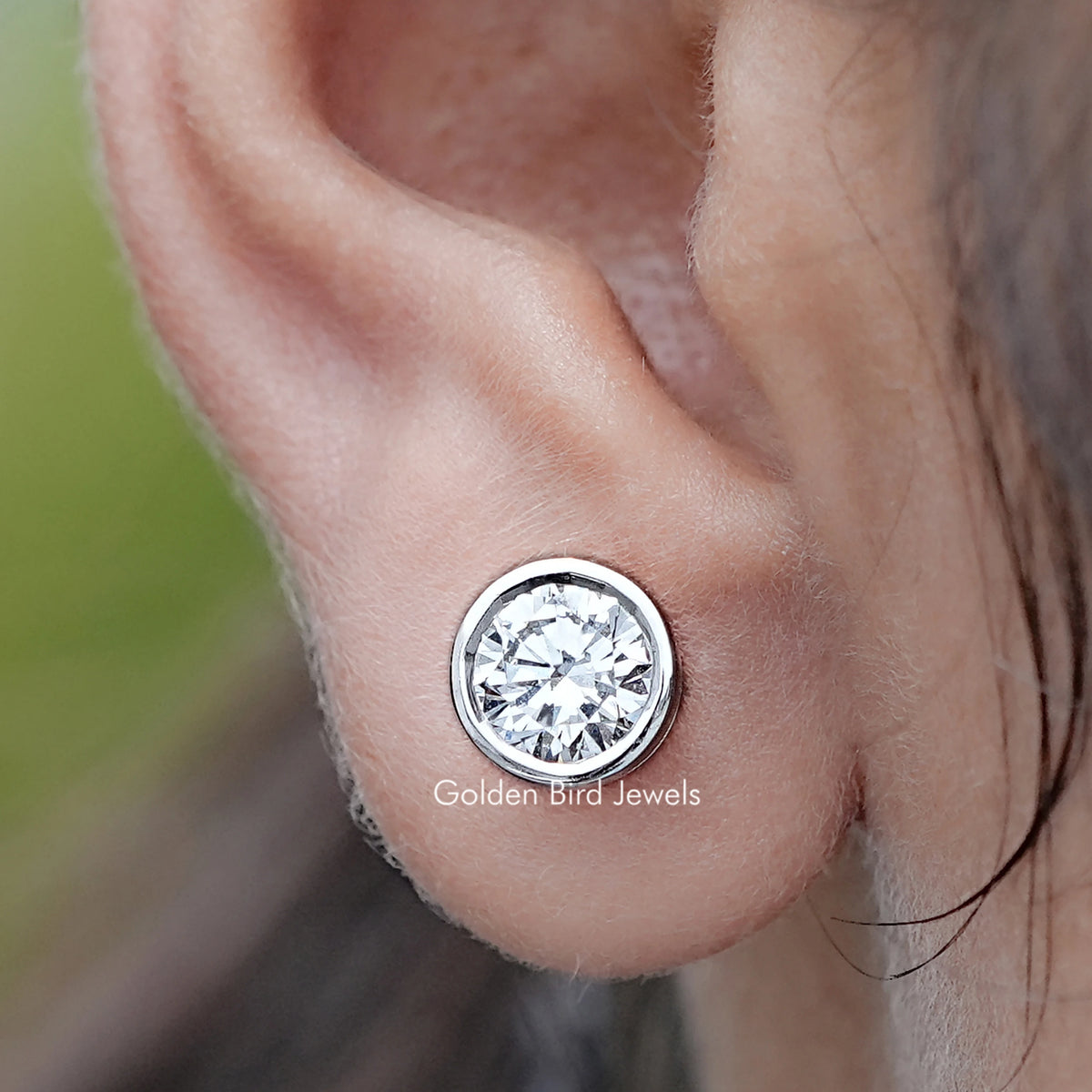 Close up view of Round Cut Lab Diamond Bezel Stud Earrings
