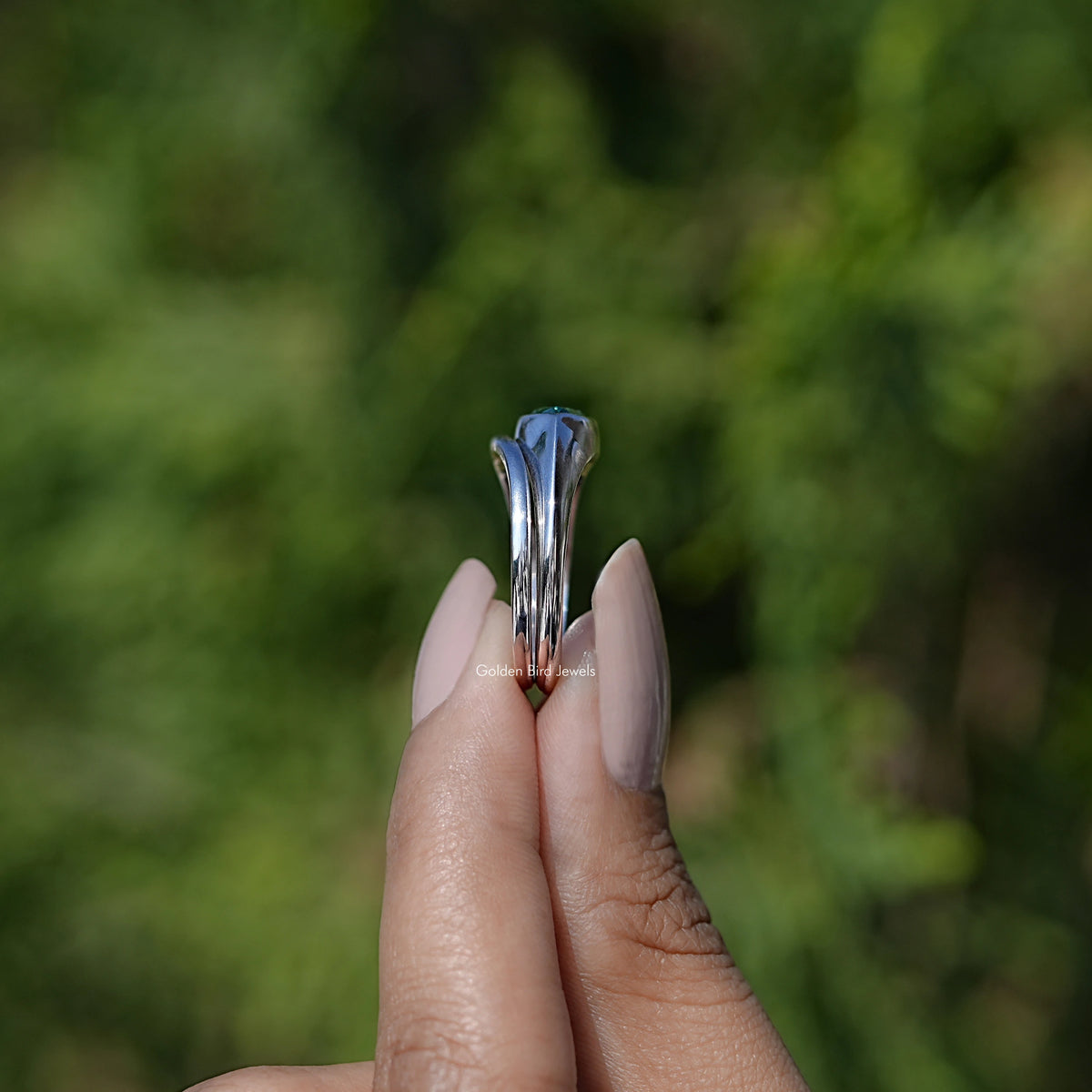 Side View of East West Green Marquise Bezel Set Moissanite Ring Set