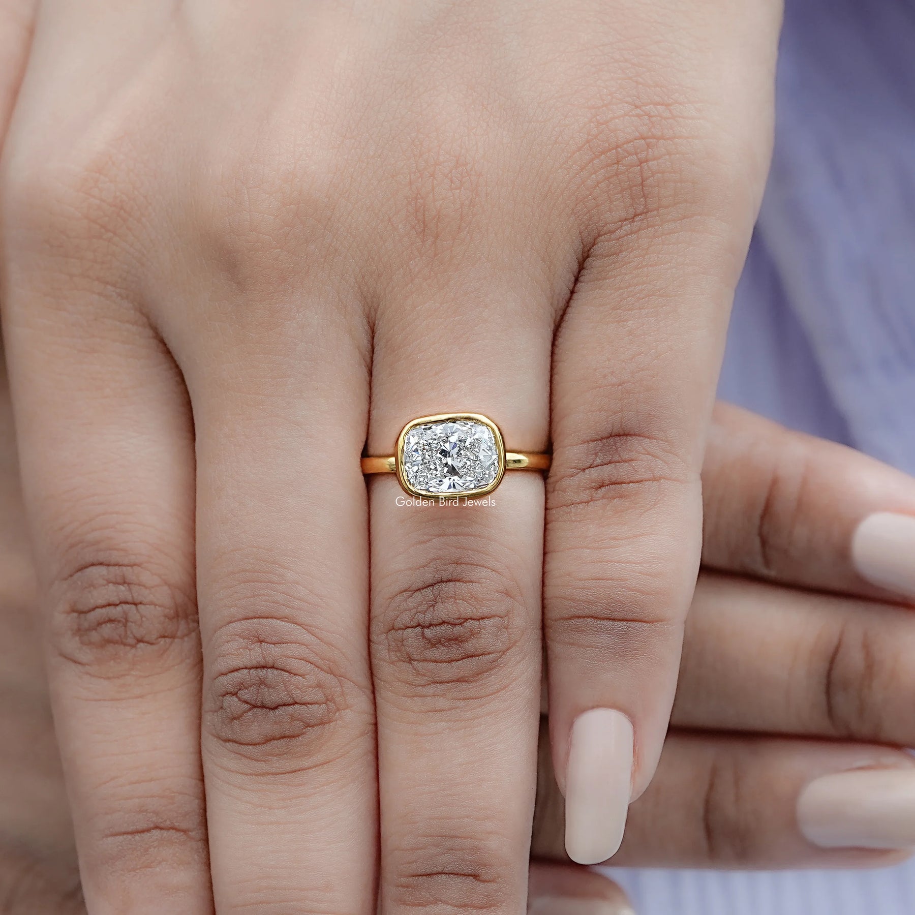 Top view of East West Cushion Cut Lab Diamond Bezel Set Ring