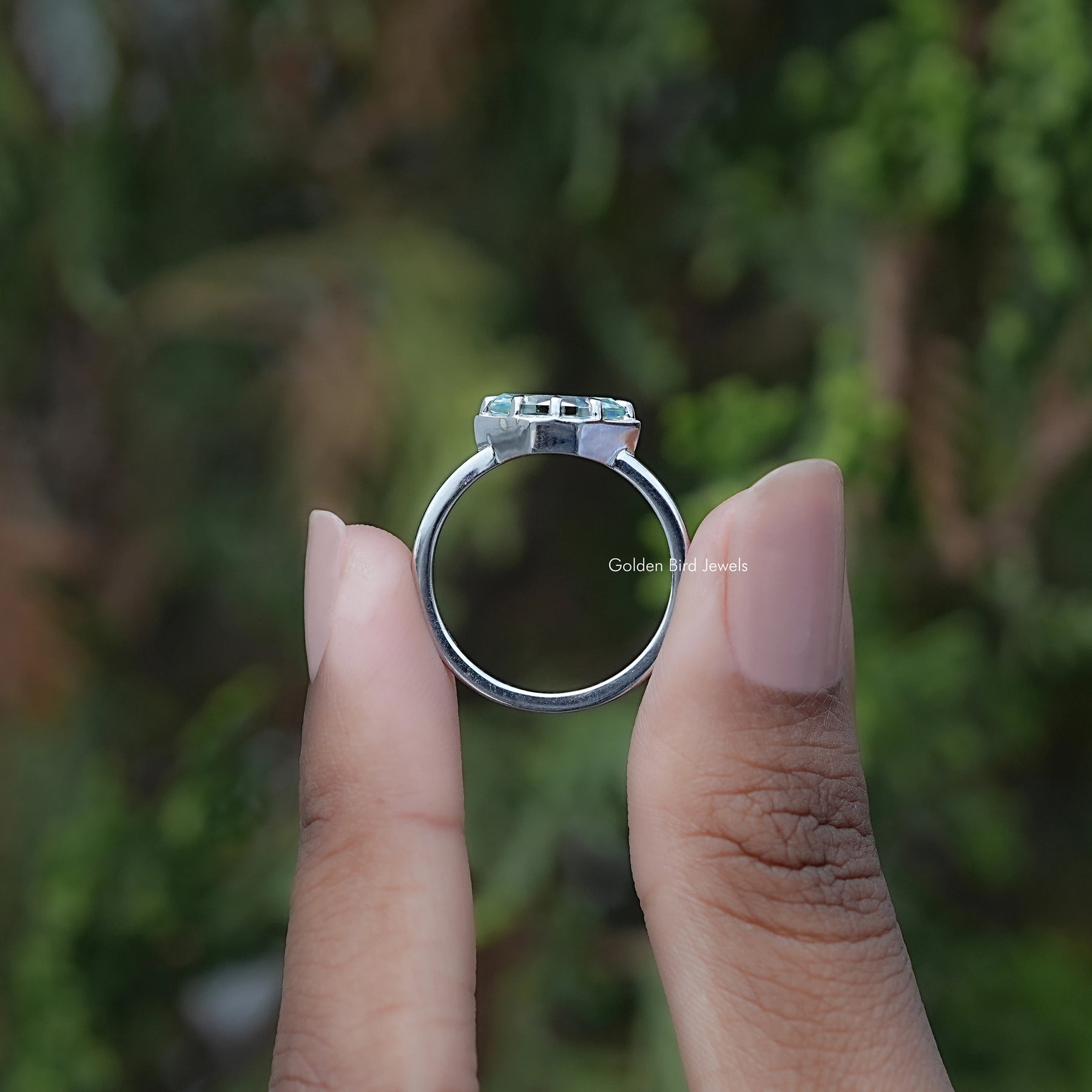 Back view of Marquise Cut Moissanite Solitaire Ring in secure setting