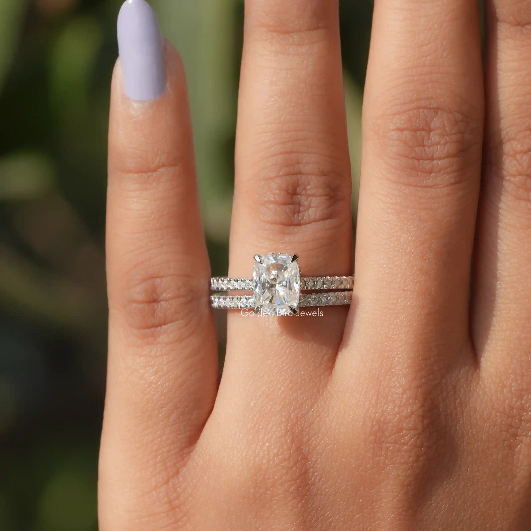 View of Cushion Cut Moissanite Bridal Ring Set In finger