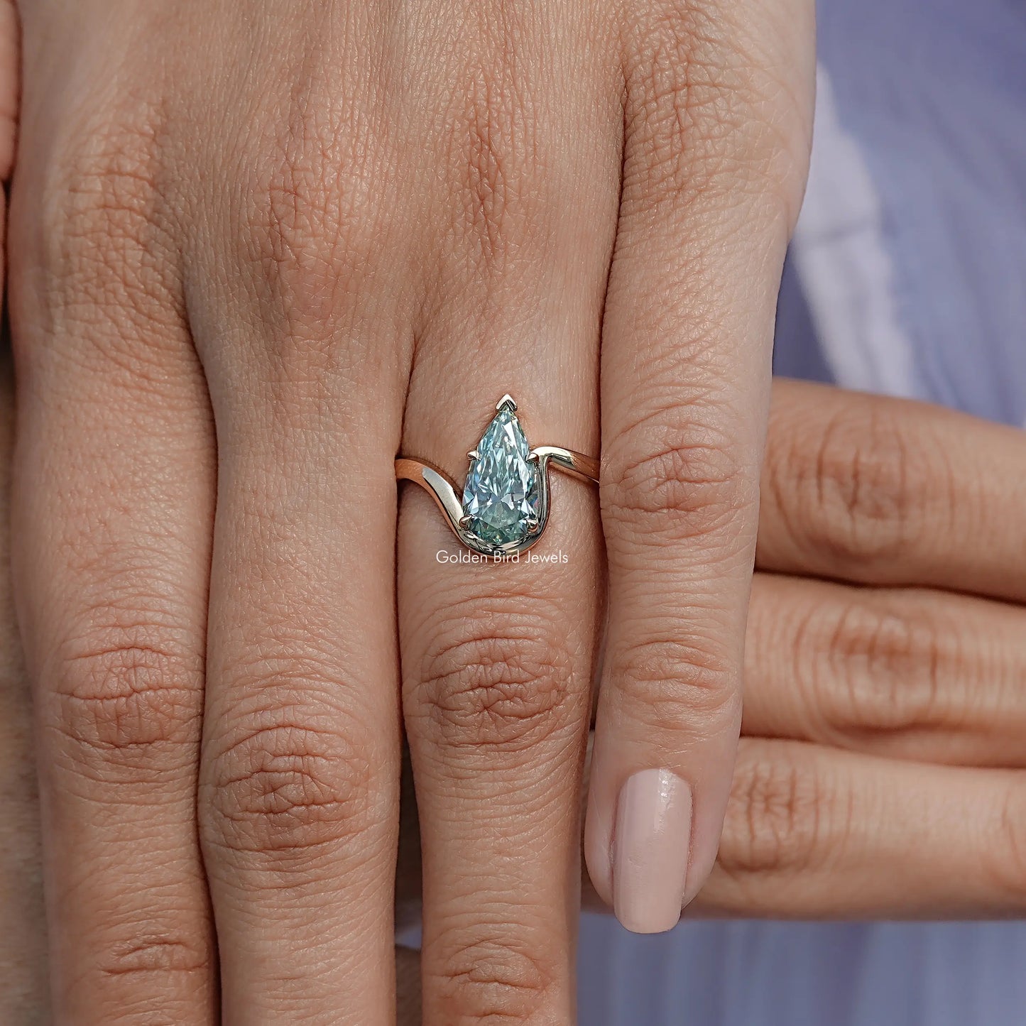 Detailed View Of Elongated Pear Moissanite Solitaire Ring