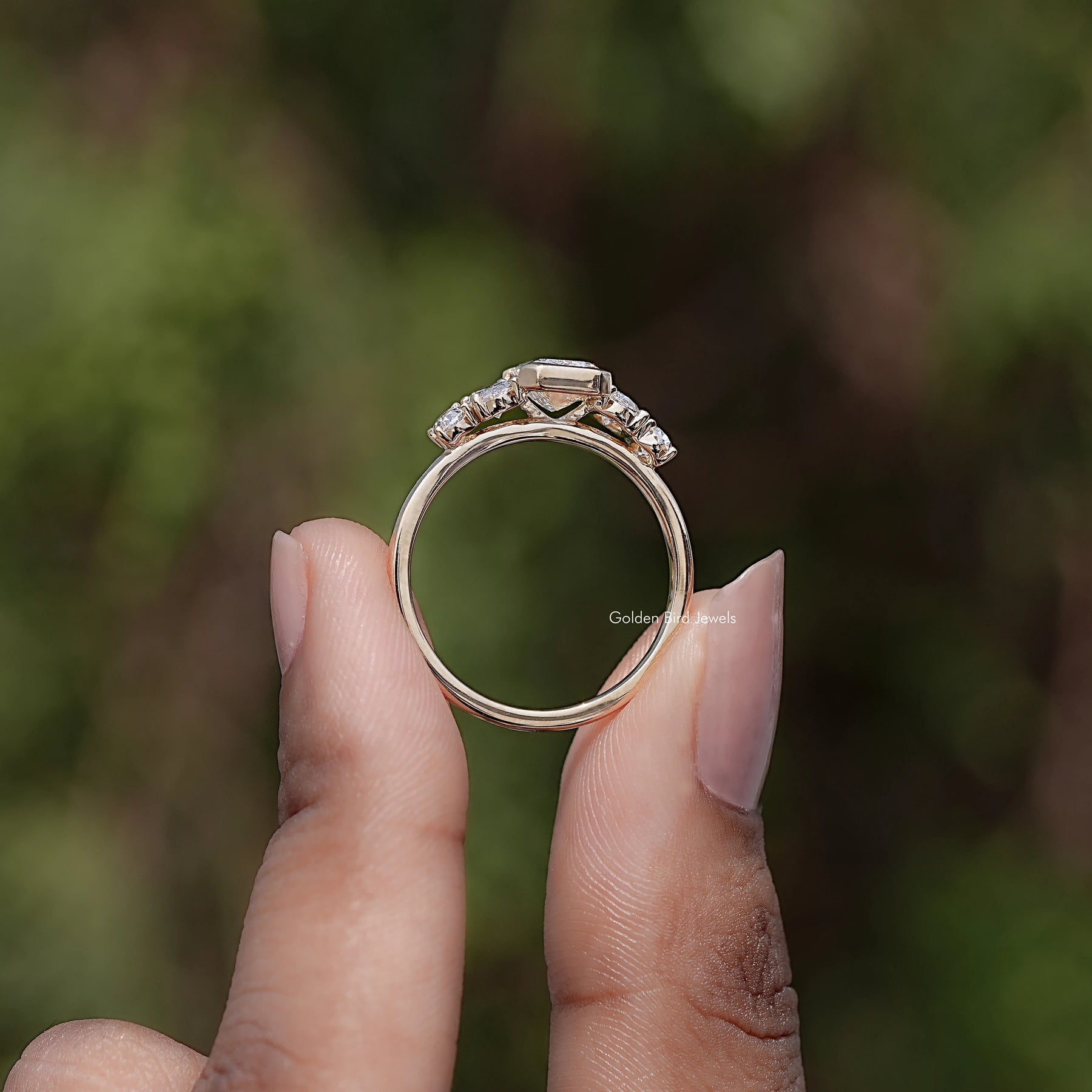 Back view of Pear And Baguette Cut Lab Diamond Five Stone Ring