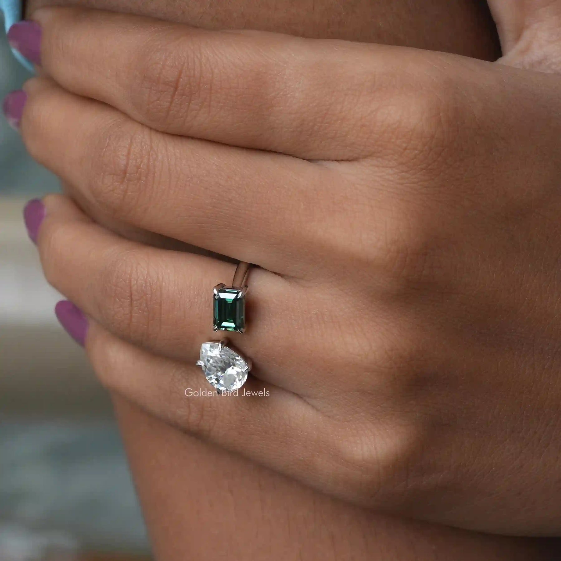 Close view of in  Finger a 2 Stone Moissanite  Open Ring