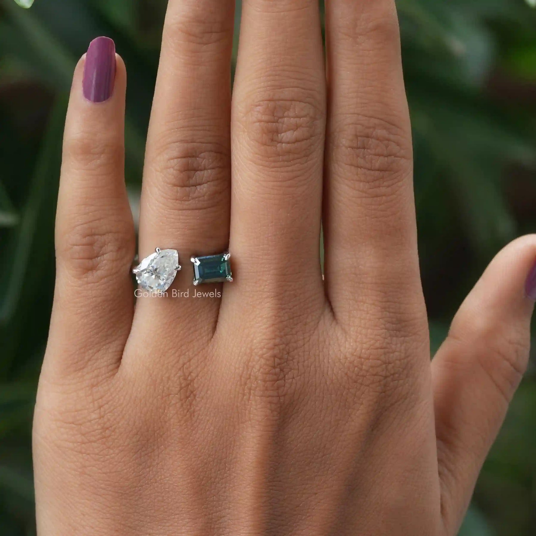 In Finger Front View Of a Moissanite 2 Stone Engagement Ring