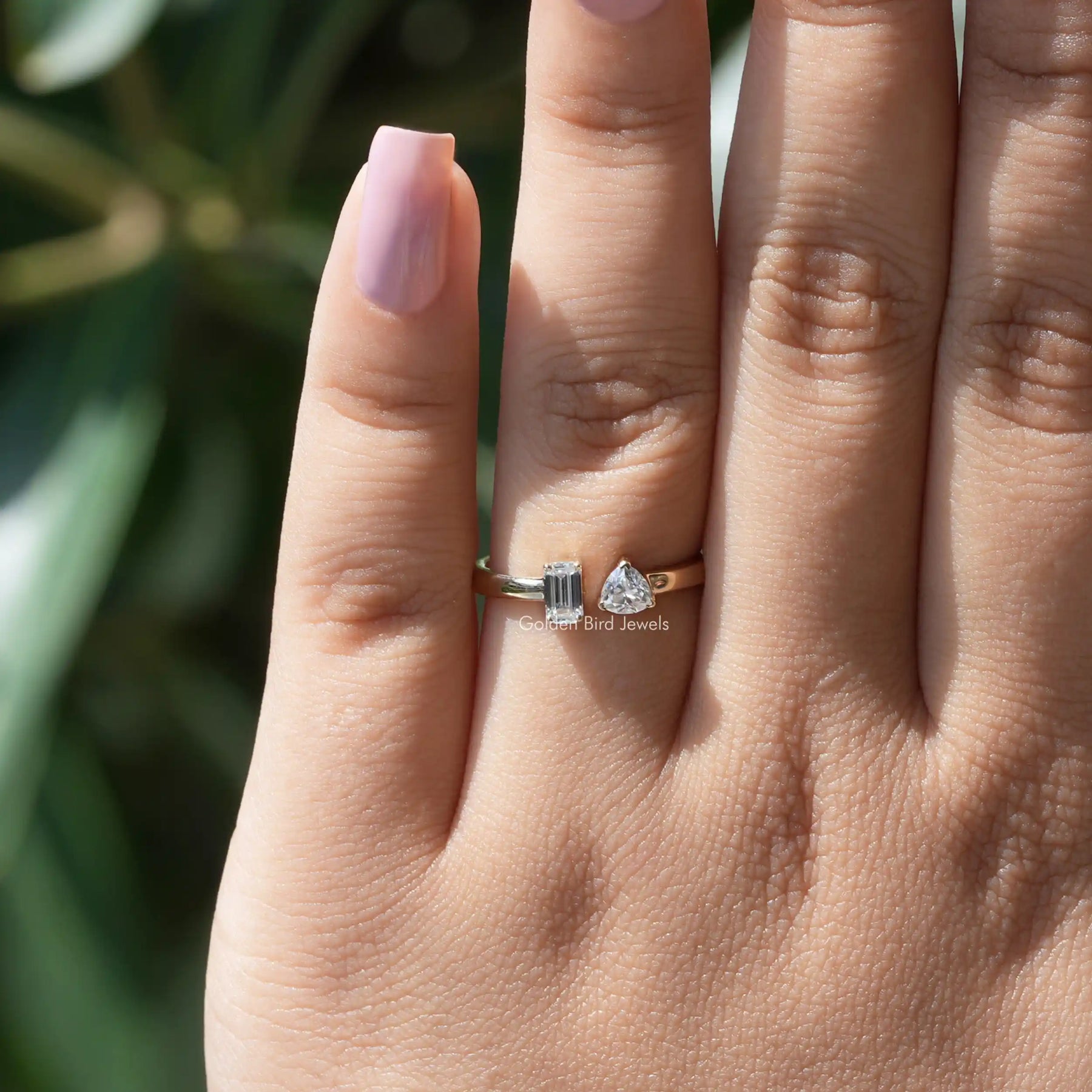 View of Emerald And Triangle Cut Moissanite Ring In White Gold