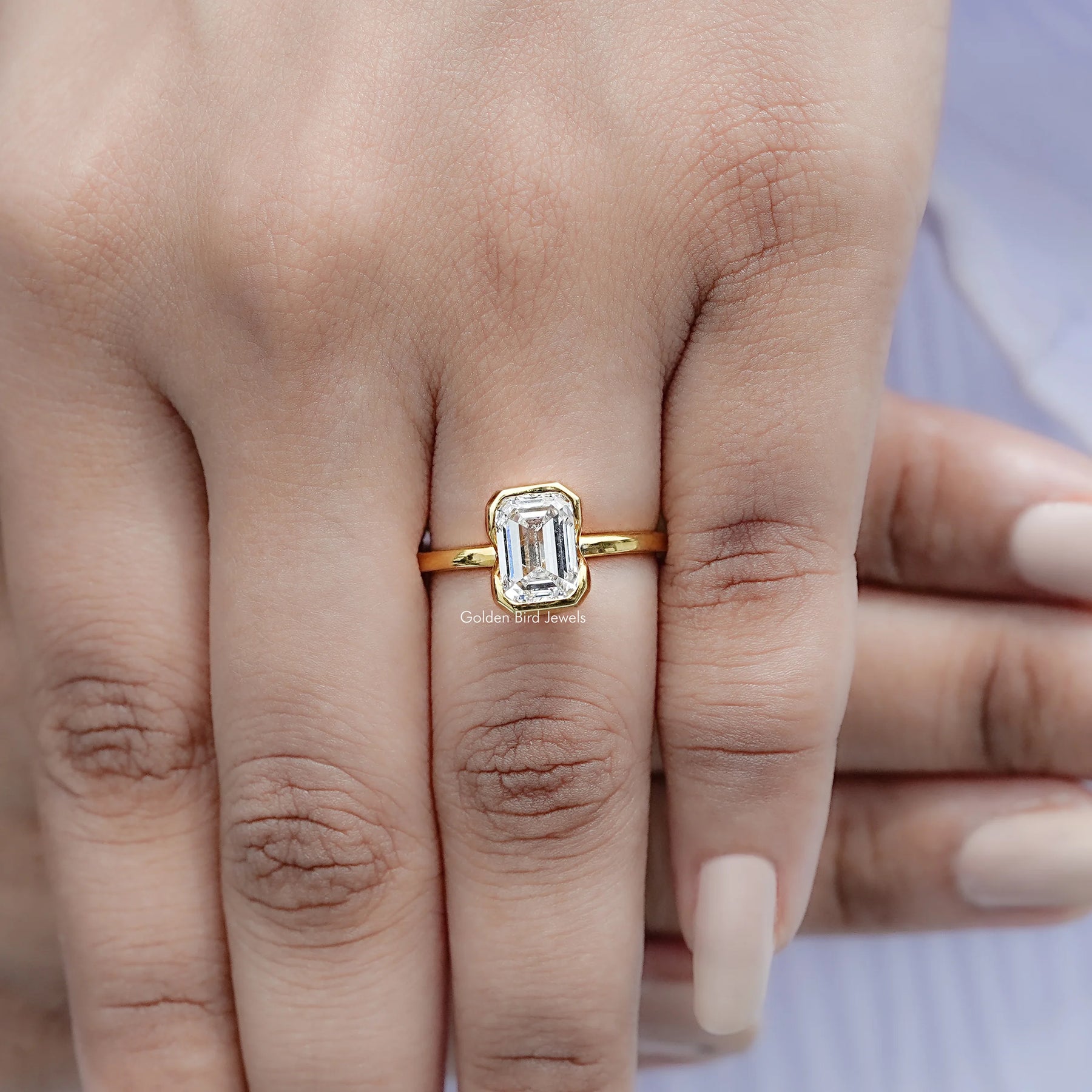 Top view of Emerald Cut Diamond Bezel Set Solitaire Ring