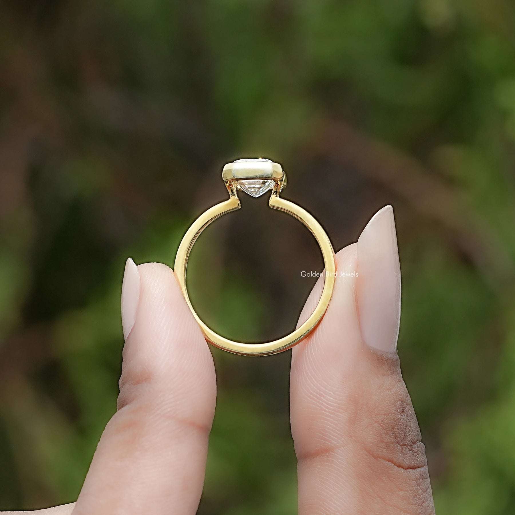 Back view of Emerald Cut Diamond Bezel Set Solitaire Ring