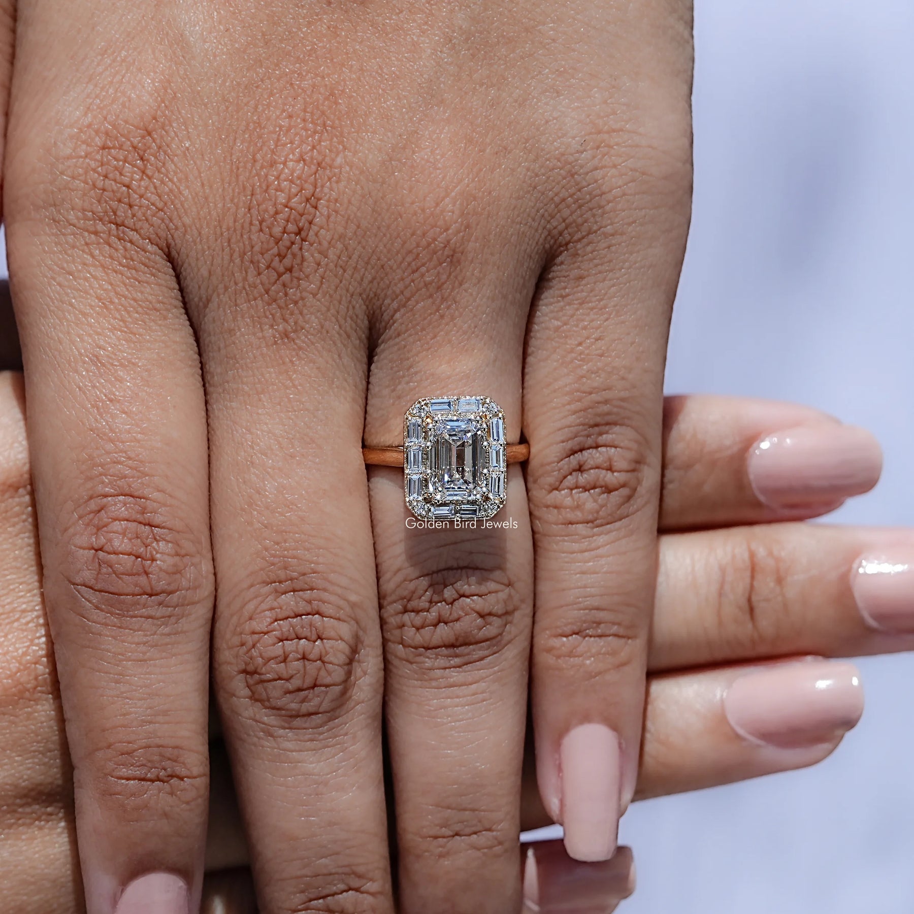 View of Emerald Shaped Solitaire Moissanite Ring in prongs setting