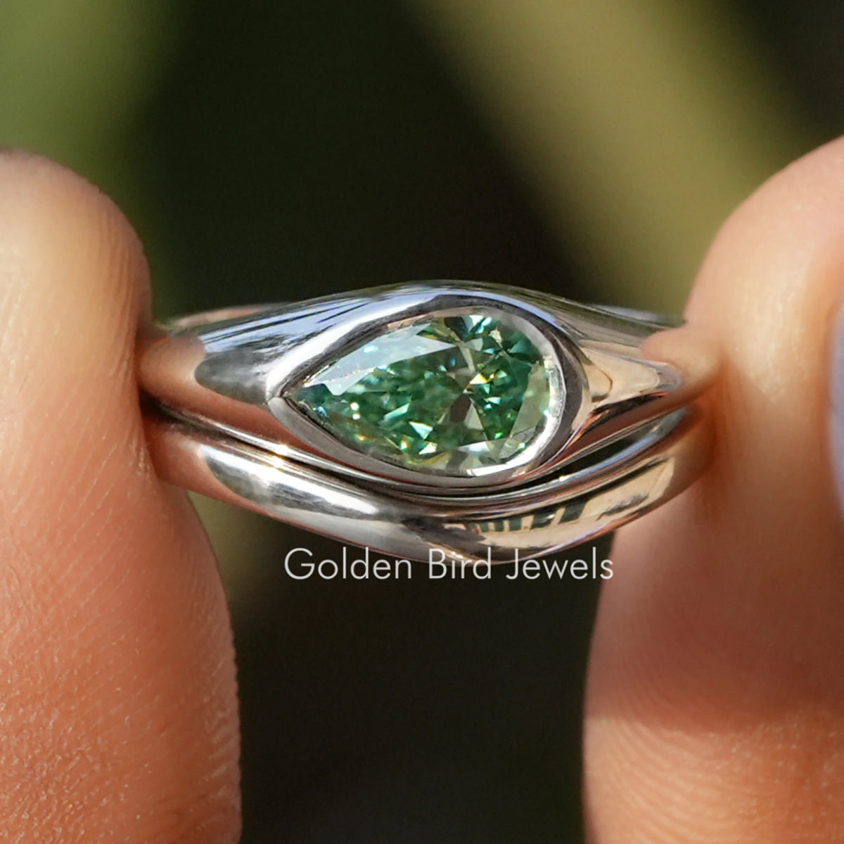 Ost-West Birnenförmiger Solitär-Moissanitring