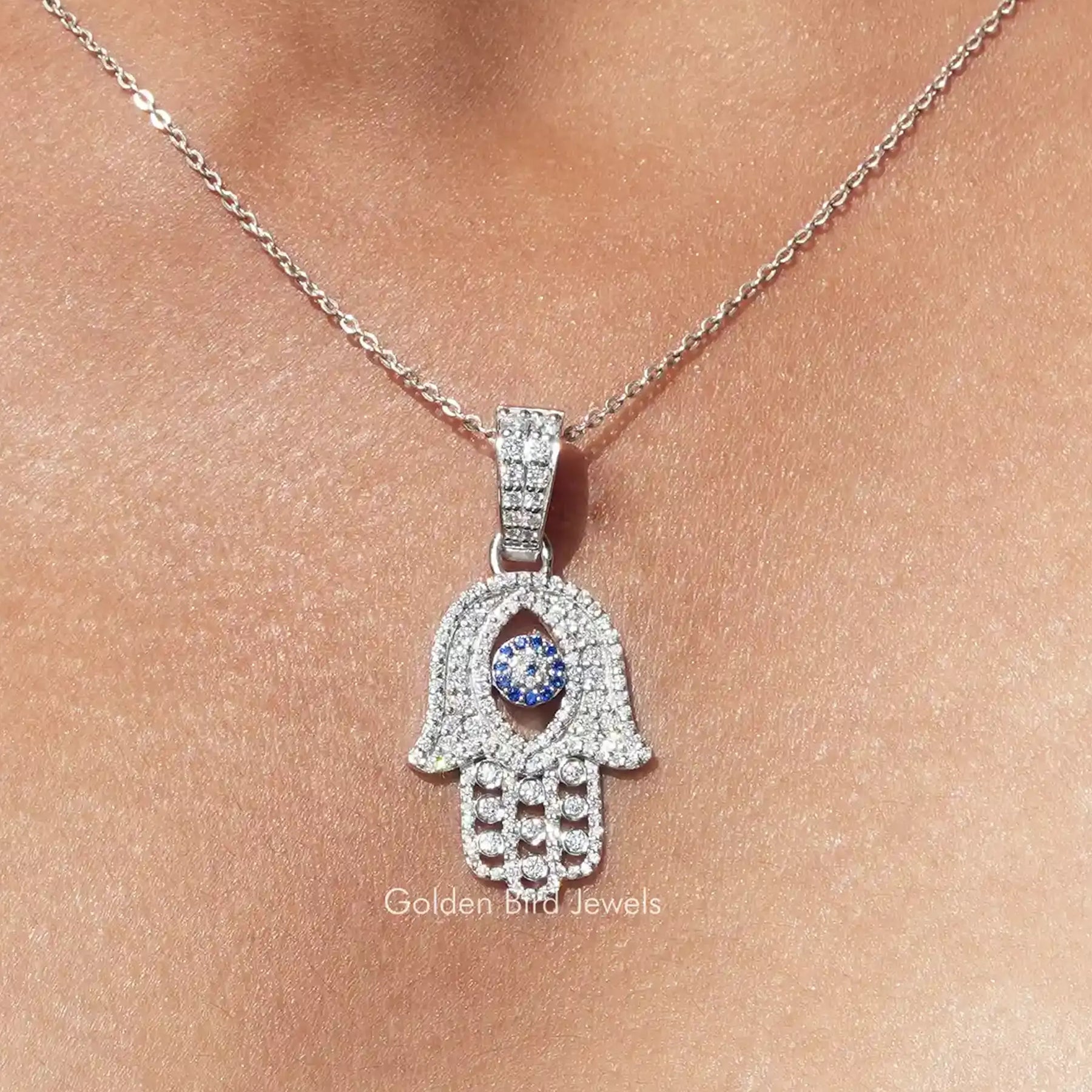 Moissanit-Anhänger mit Hamsa-Hand und bösem Blick im Rundschliff