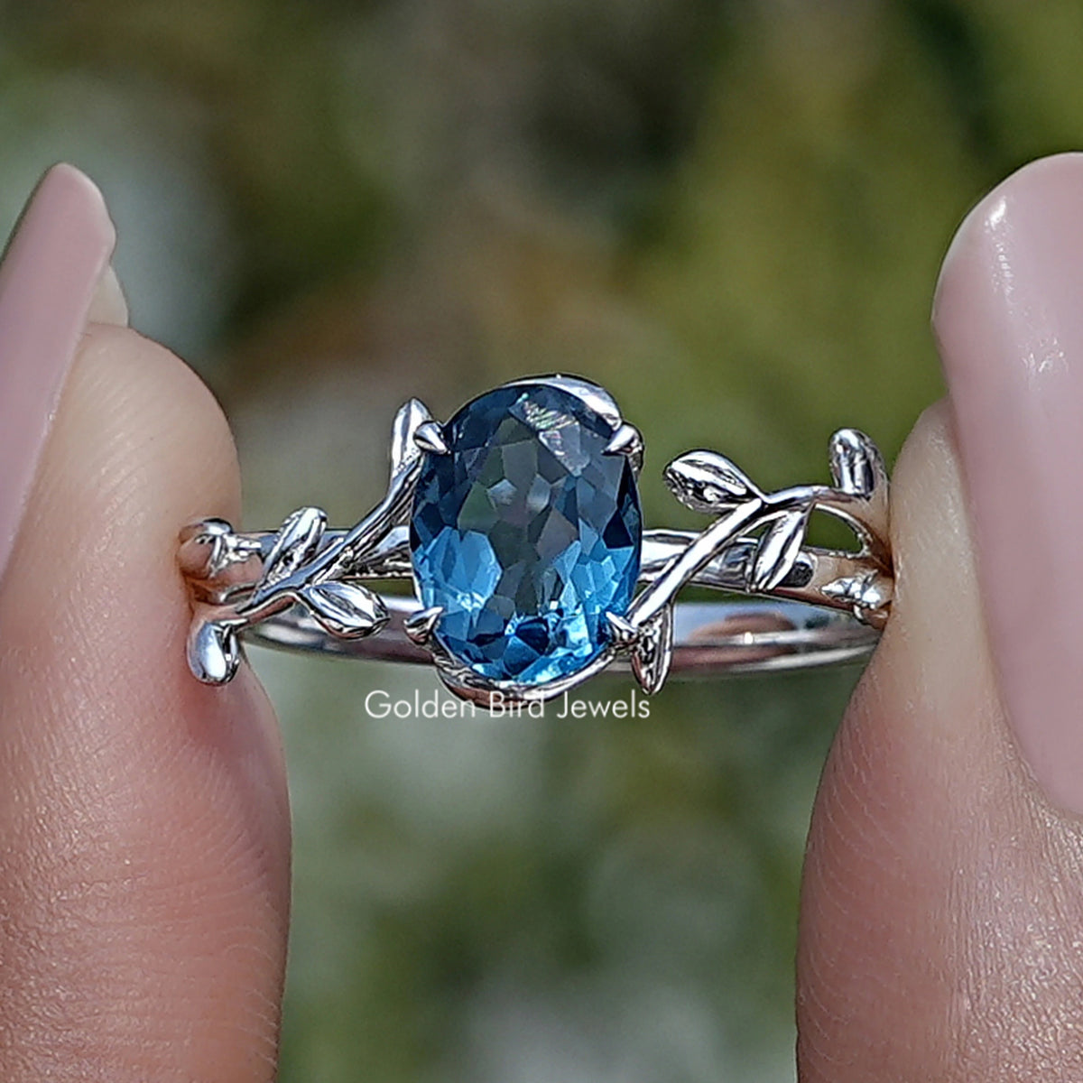 Sapphire Blue Oval Gemstone Leaf Style Ring