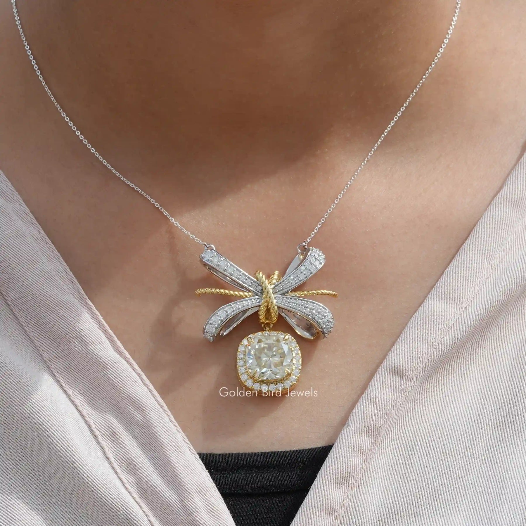 In neck front view of cushion cut halo pendant