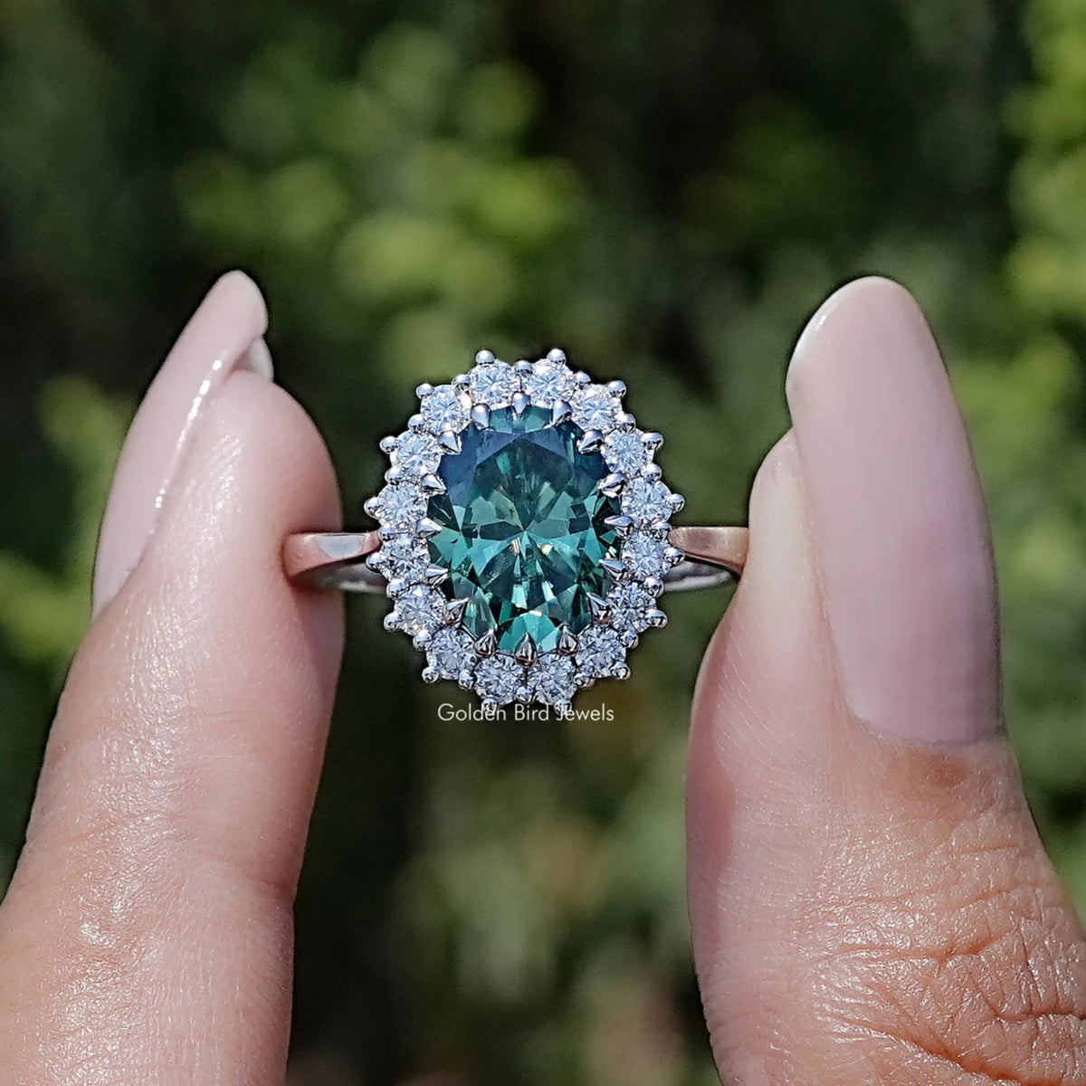 Front view of Green Oval Cut Moissanite Halo Engagement Ring