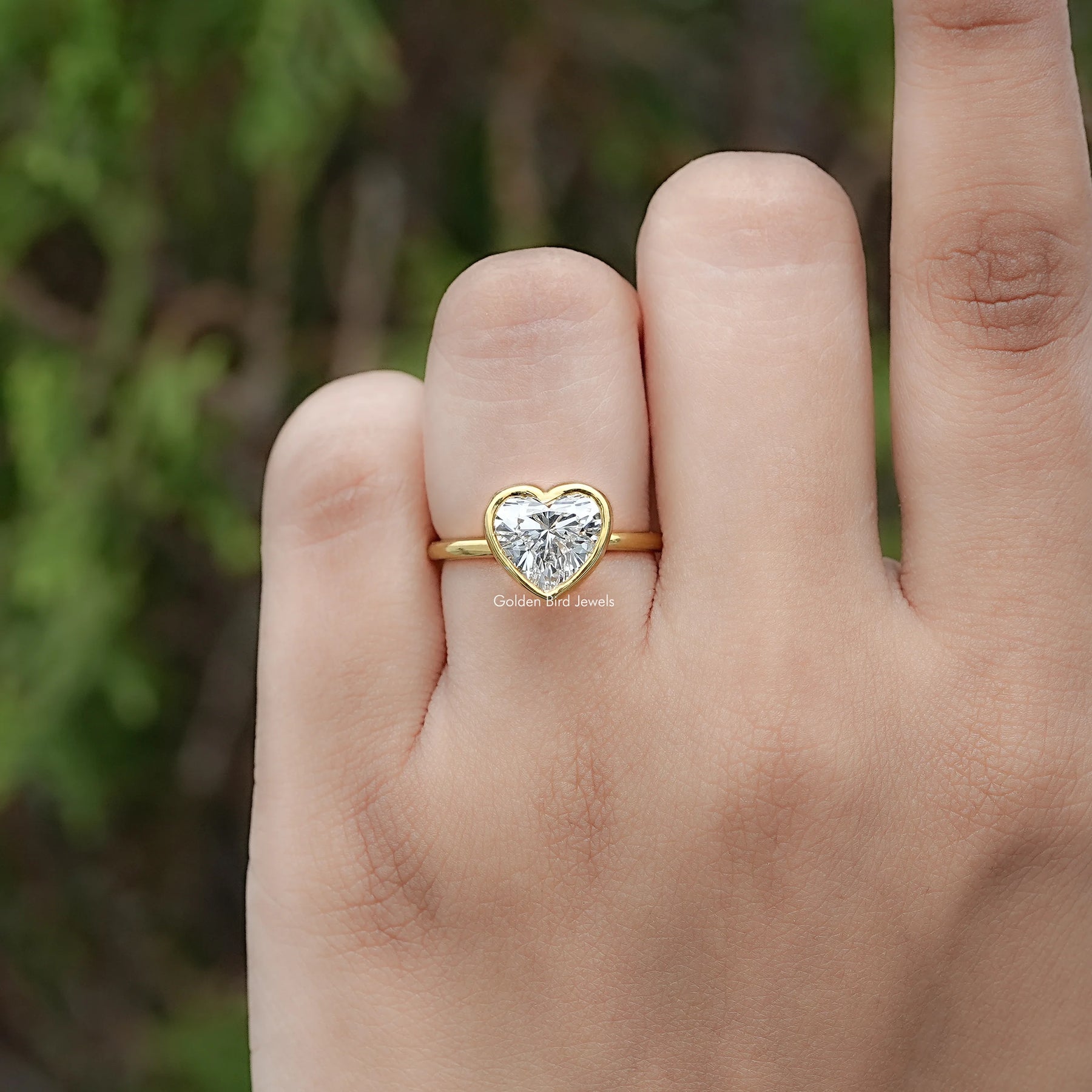 Front view of Heart Shaped Diamond Bezel Set Ring