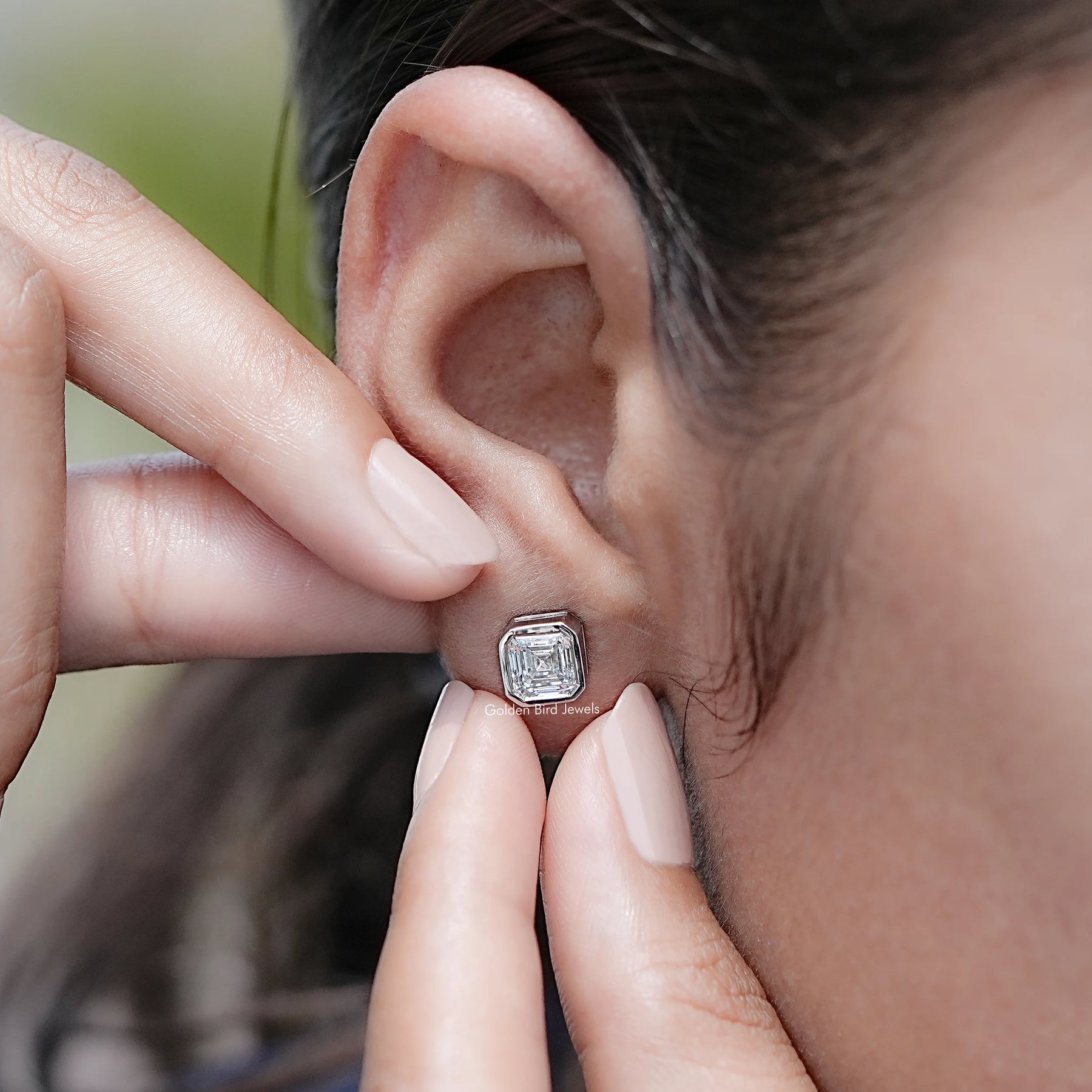 Display view of Asscher Cut Diamond Set Stud Earrings In Ear