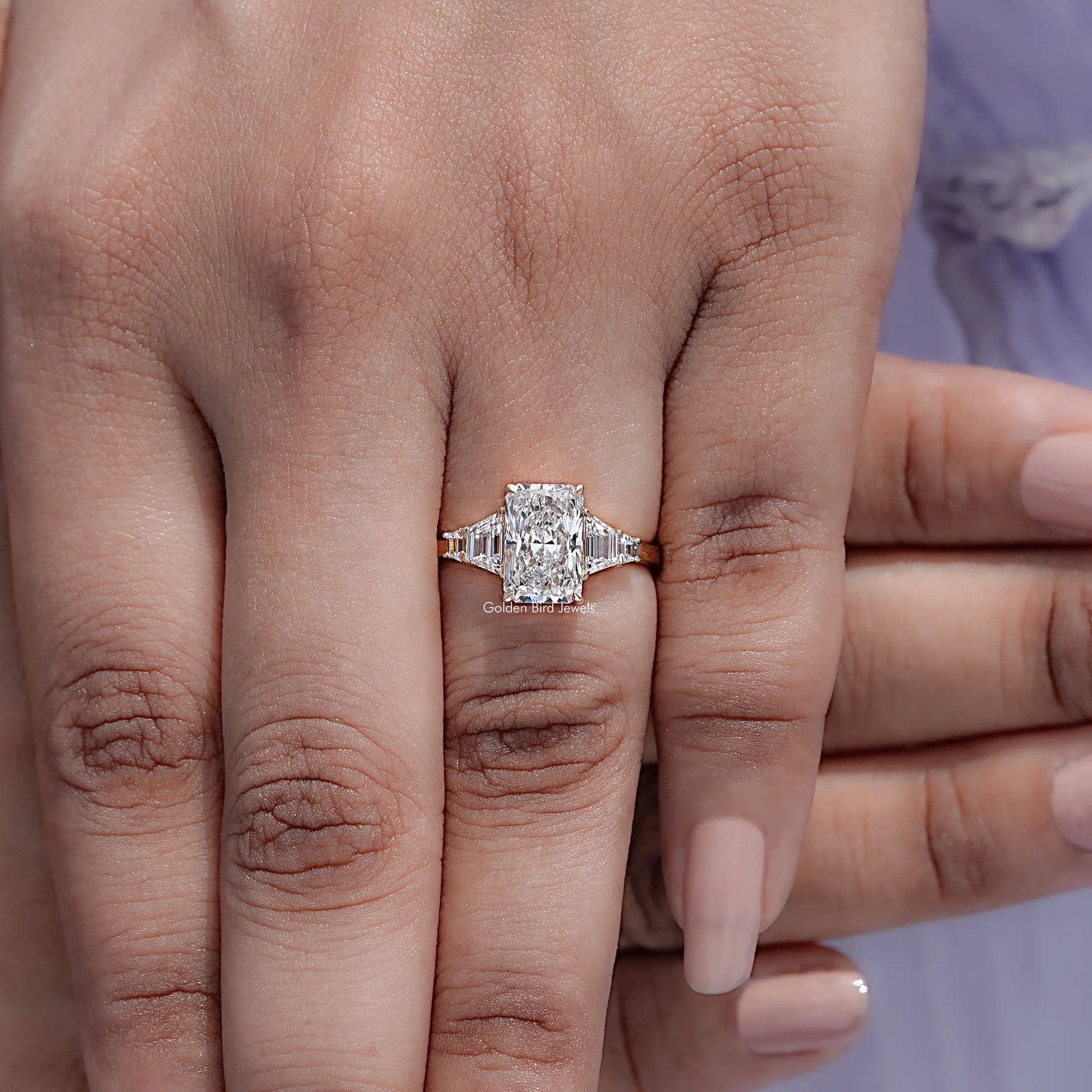 Detailed view of Radiant And Step Cut Trapezoid Diamond Ring