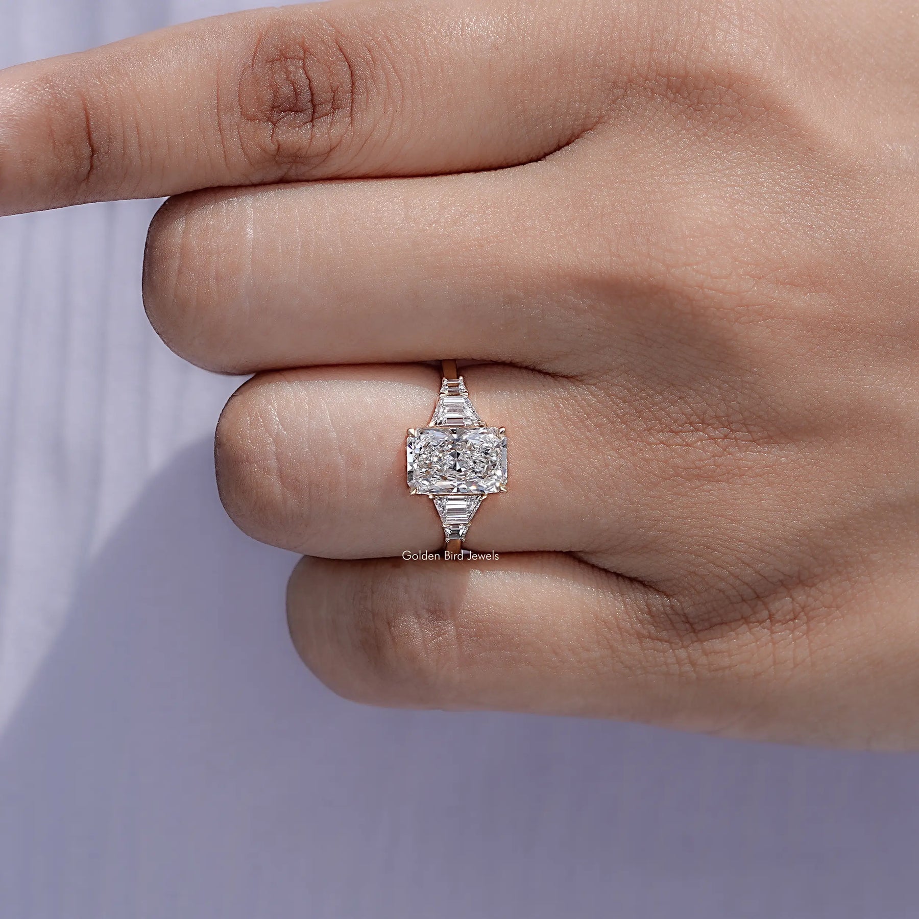Top view of Radiant And Step Cut Trapezoid Lab Diamond Ring