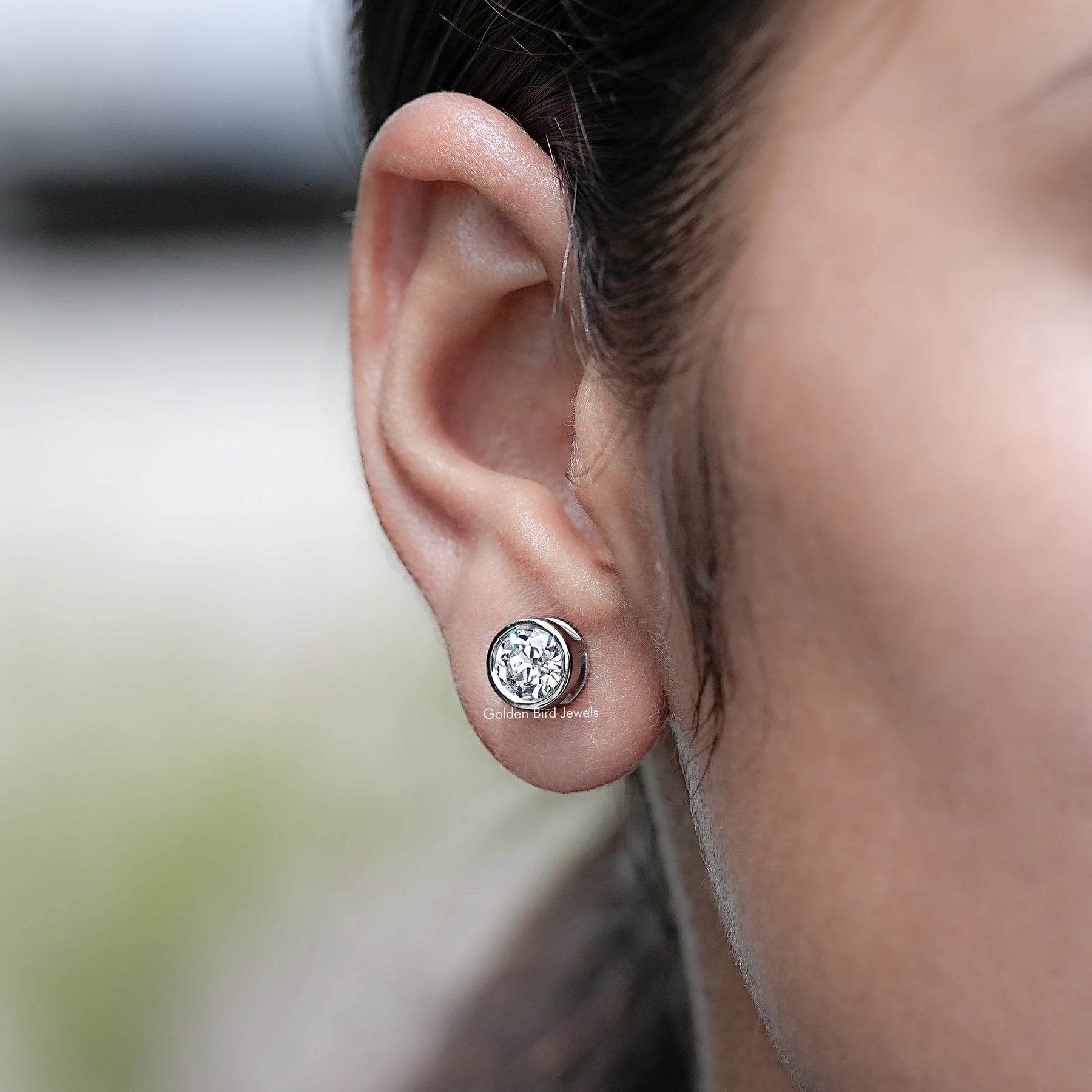 Side View of Old European Cut Round Diamond Earrings in Ear