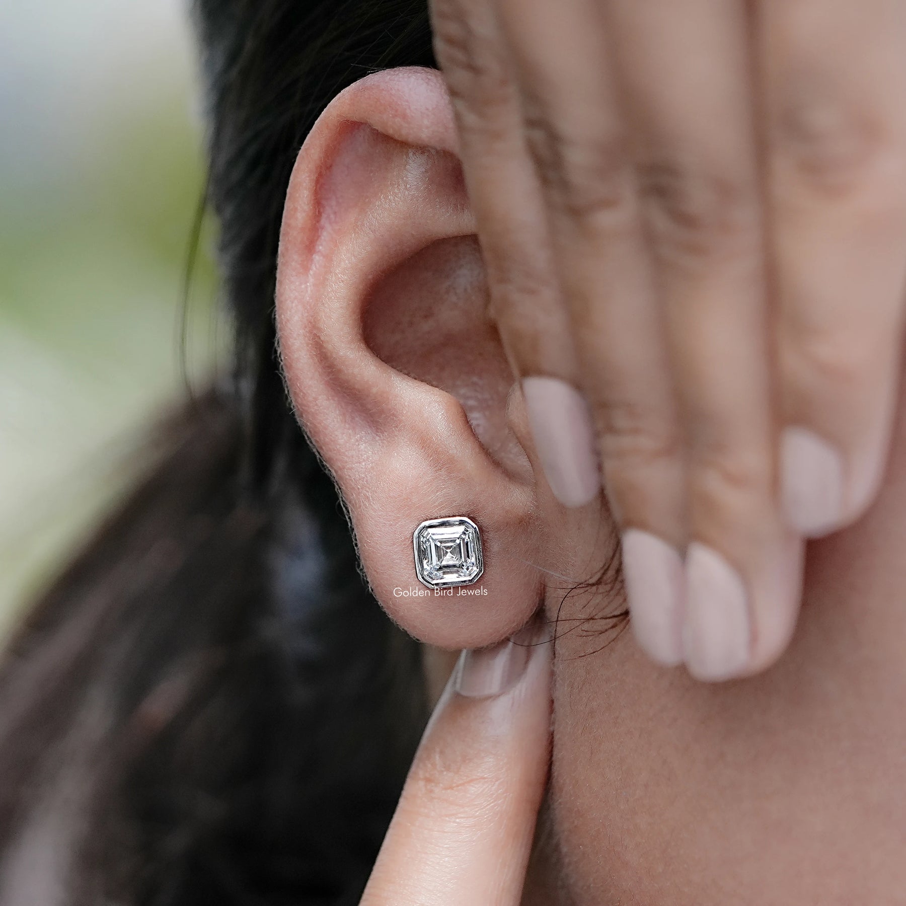 Detailed view of Asscher Cut Diamond Bezel Stud Earrings
