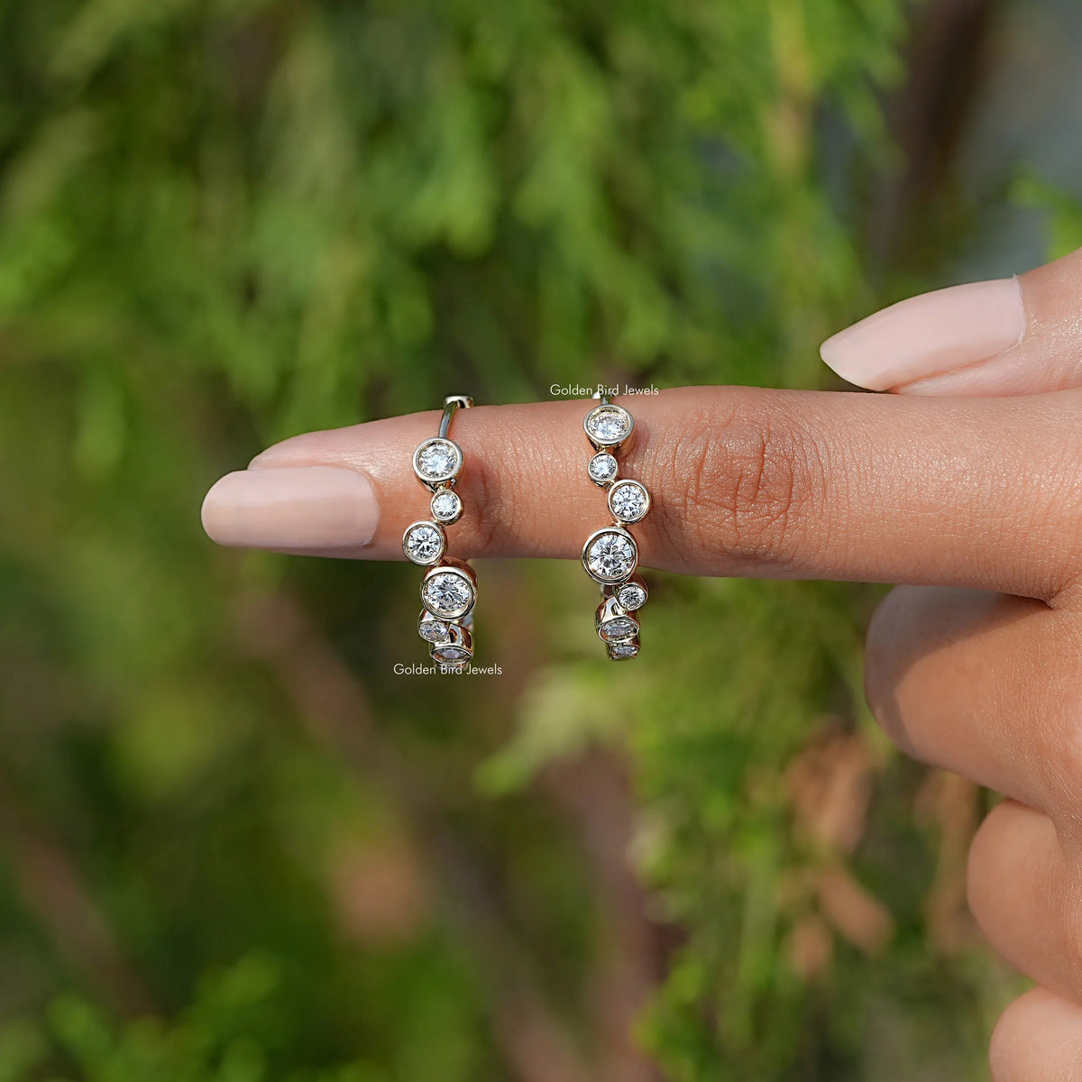 In Finger Front View of Lab Grown Round Cut Diamond Bezel Set Earrings