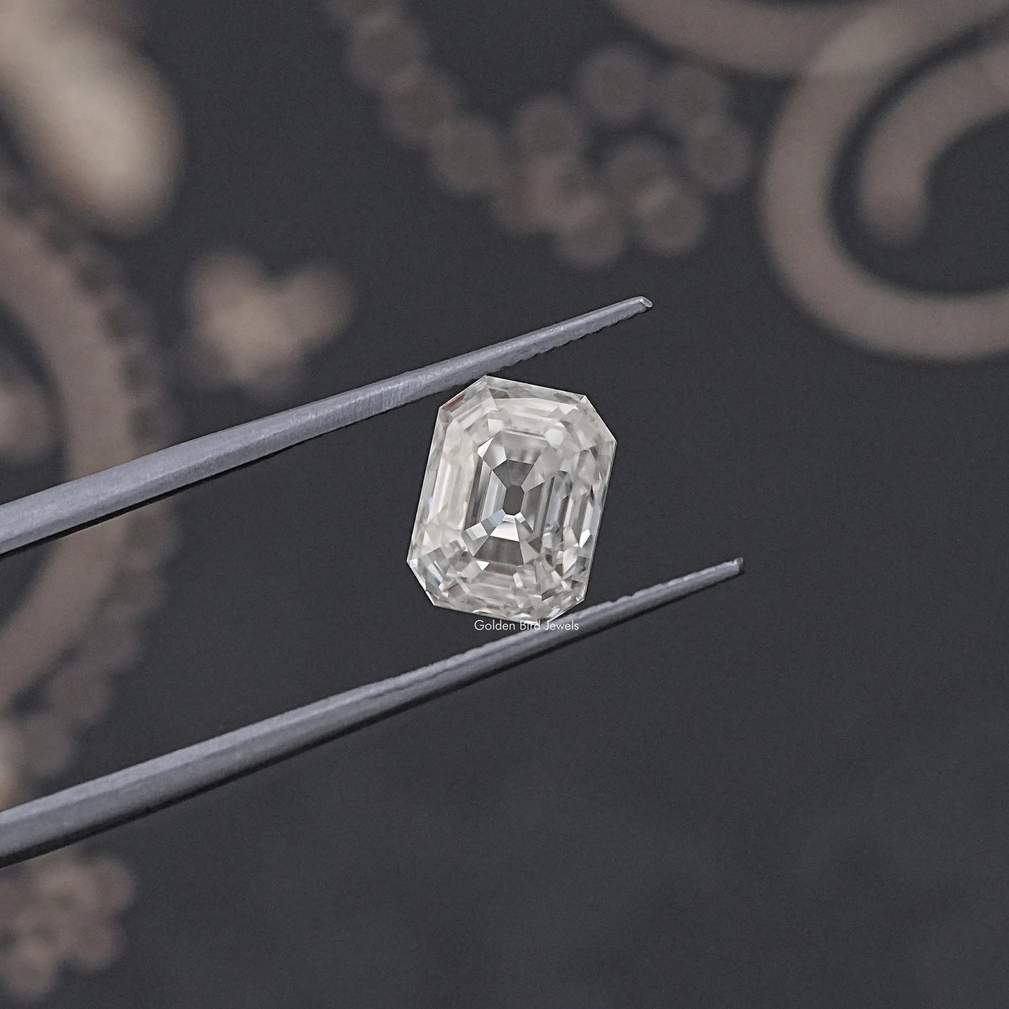 tweezers View of Timeless Old Mine Cut Emerald Moissanite Loose stone