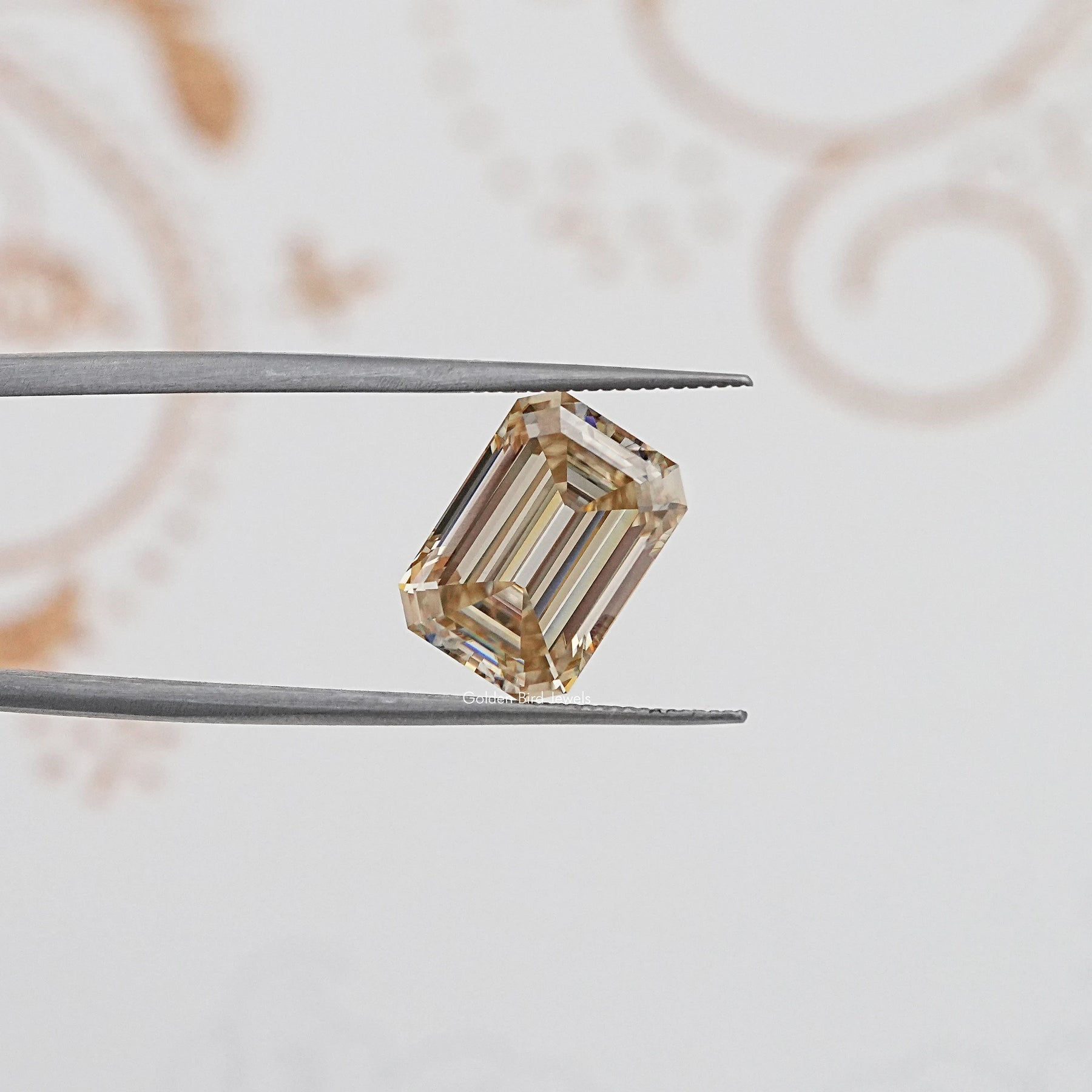 In Tweezer View Of Old Mine Emerald Cut Loose Moissanite Stone